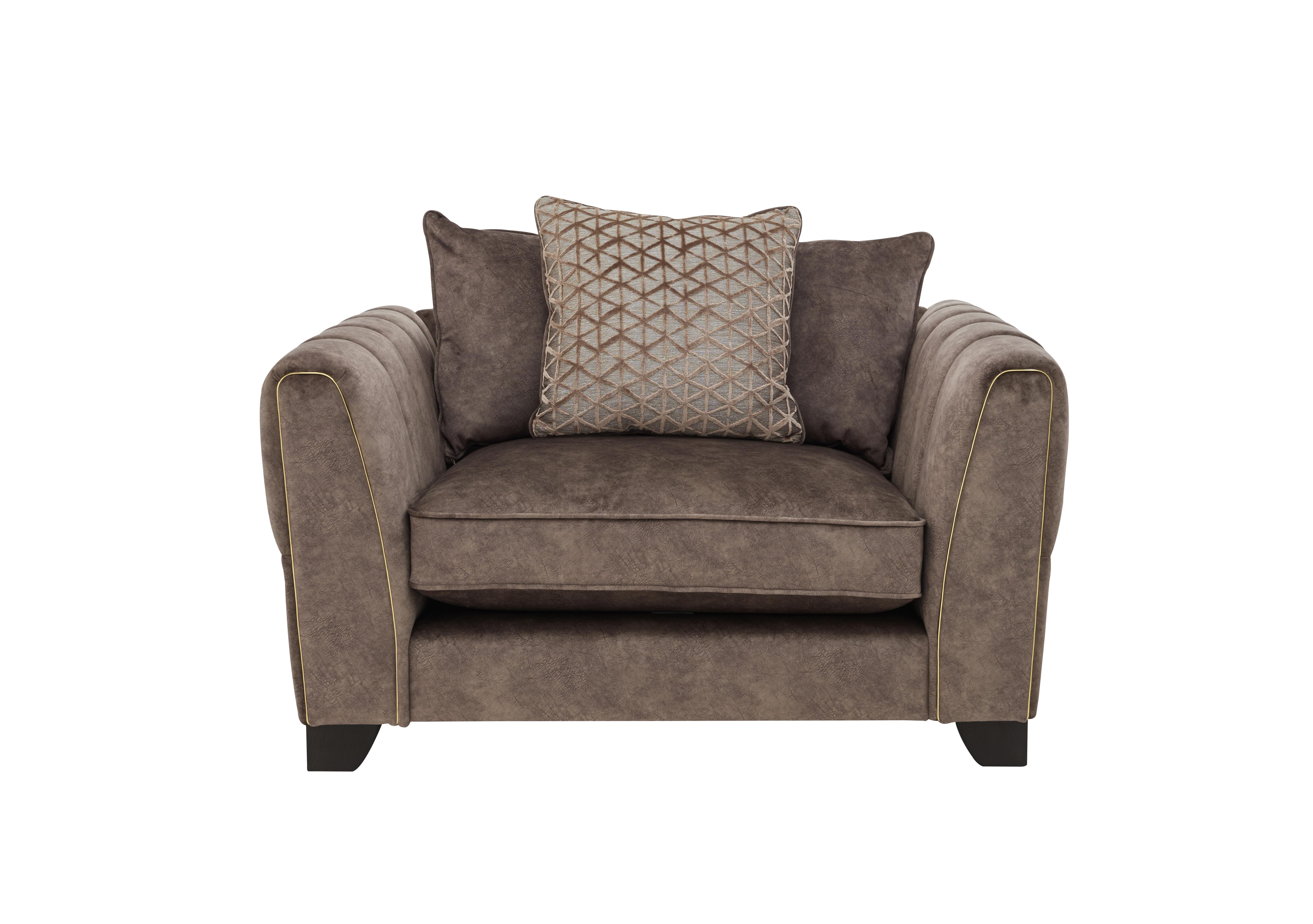 Ariana Pillow Back Fabric Snuggler Chair in Dapple Chocolate Brass Insert on Furniture Village