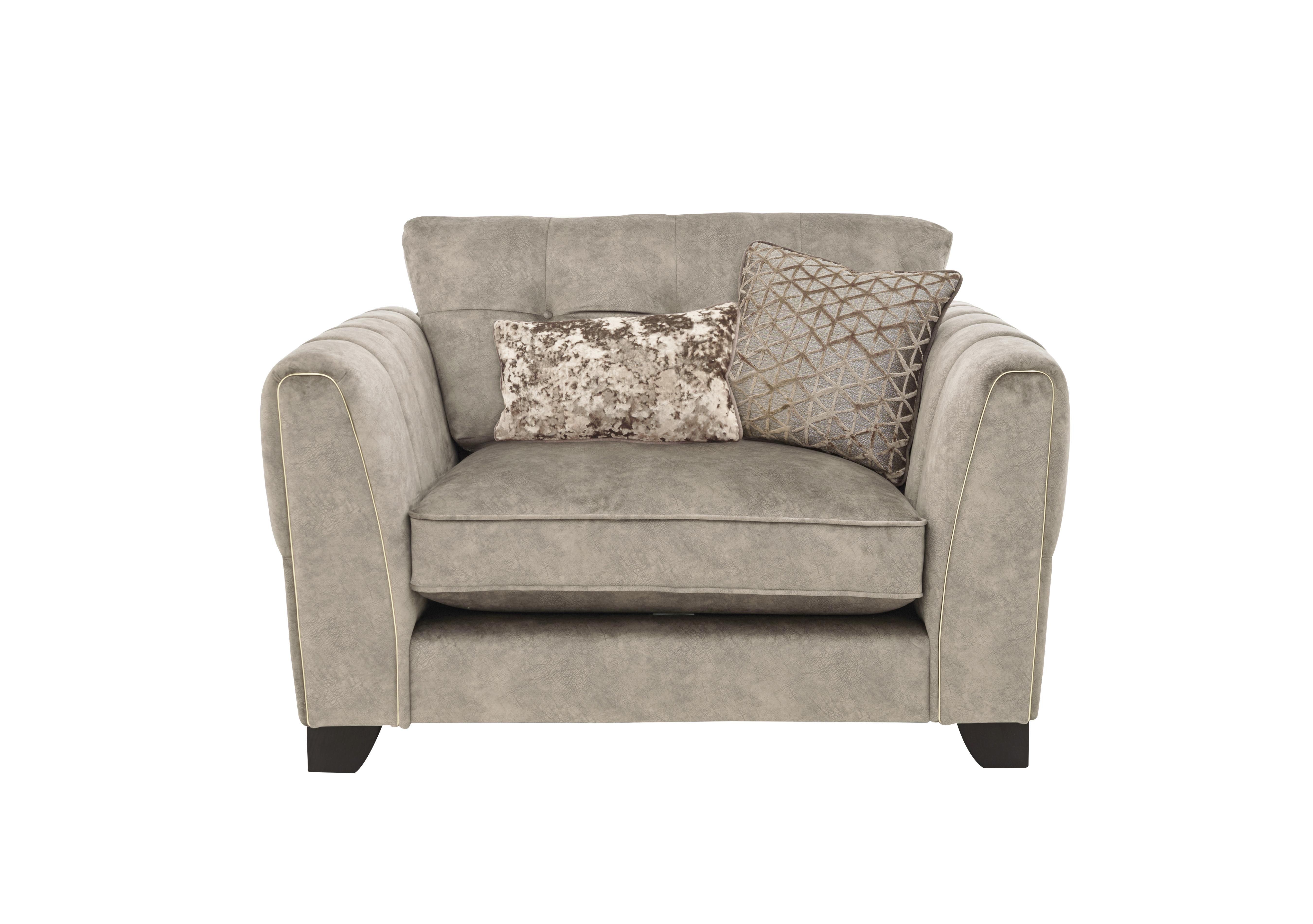 Ariana Classic Back Fabric Snuggler Chair in Dapple Oyster Brass Insert on Furniture Village