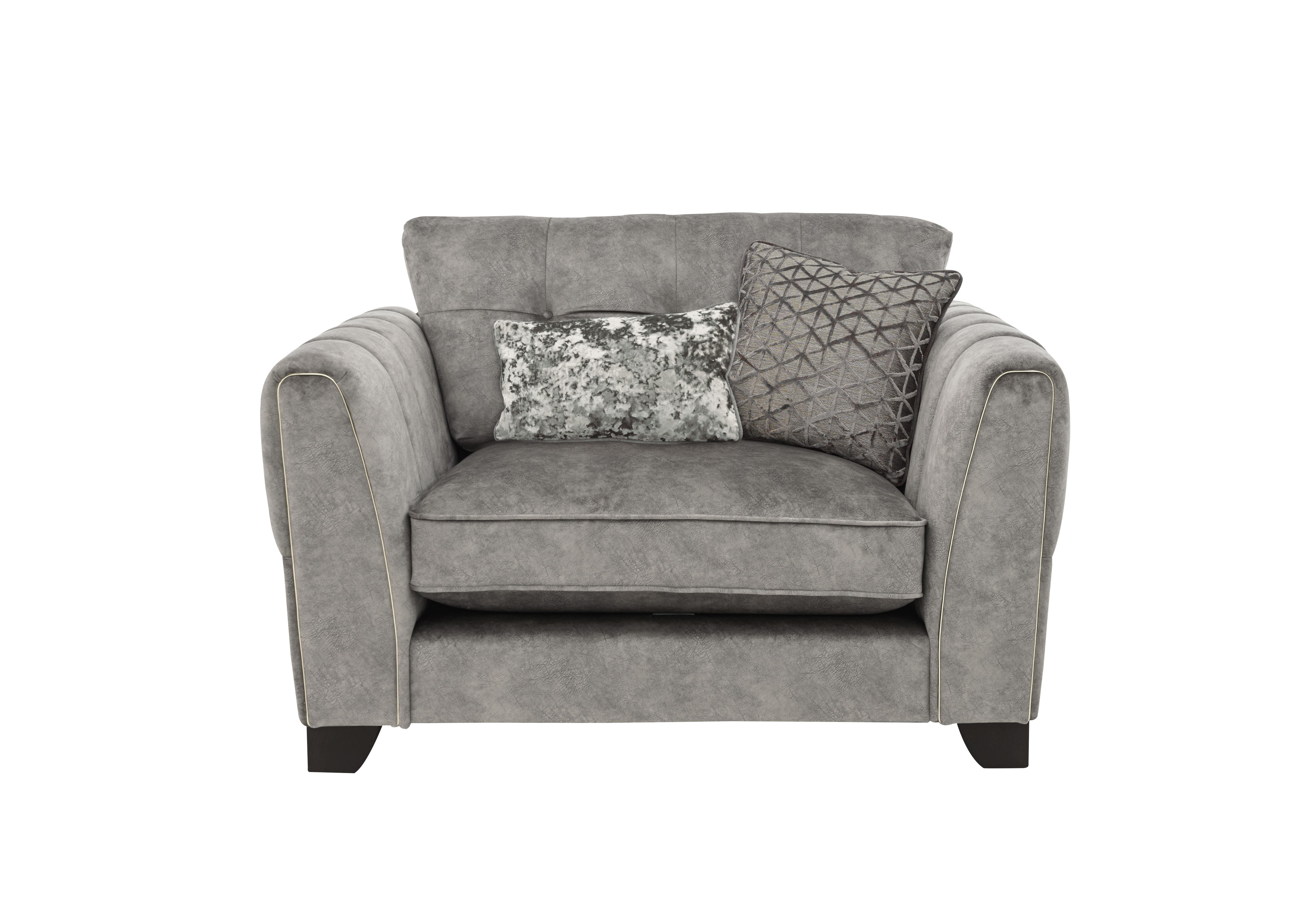 Ariana Classic Back Fabric Snuggler Chair in Dapple Silver Brass Insert on Furniture Village