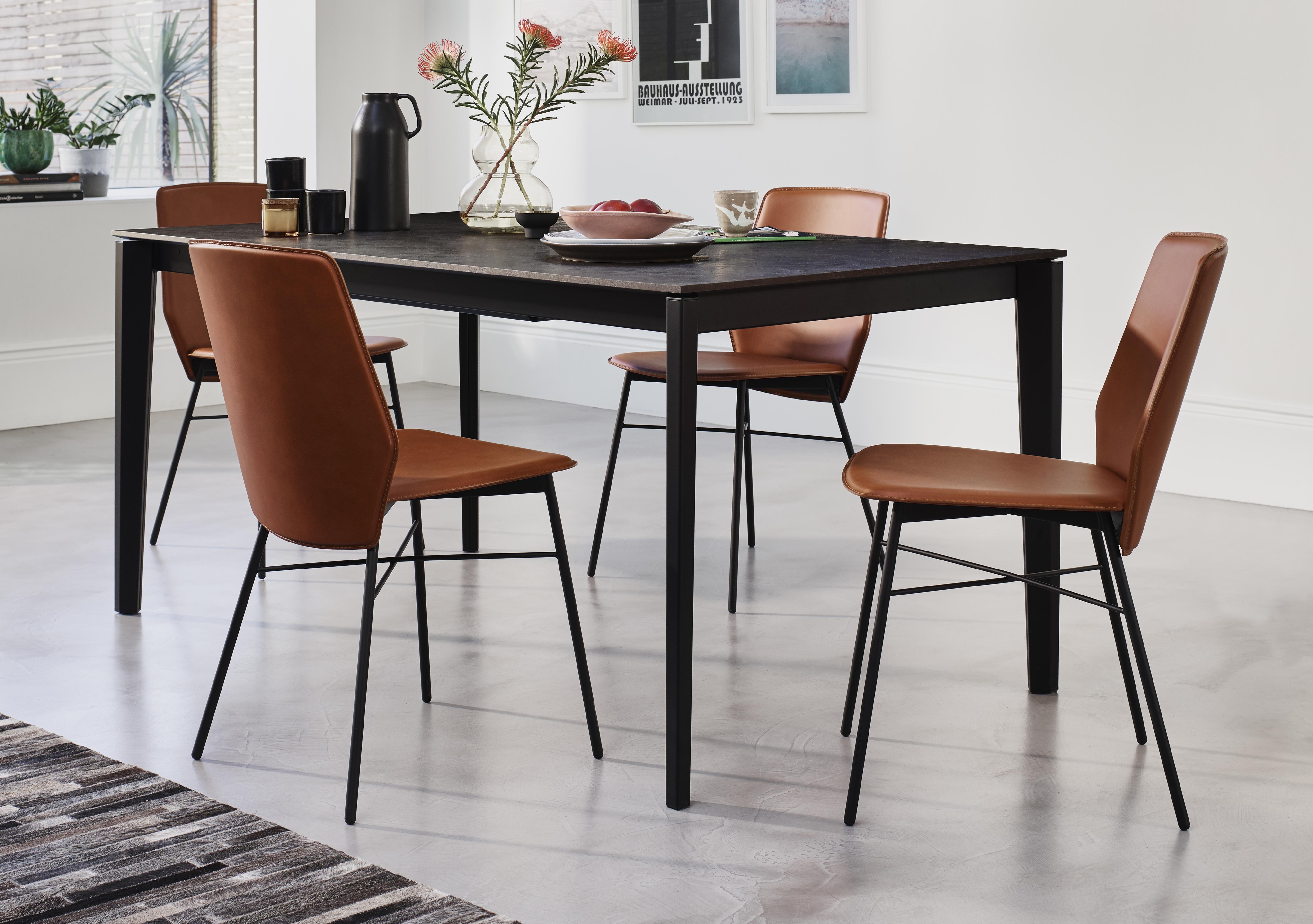 Pentagon Extending Dining Table with Oxide Bronze Top and 4 Sibilla Dining Chairs in  on Furniture Village