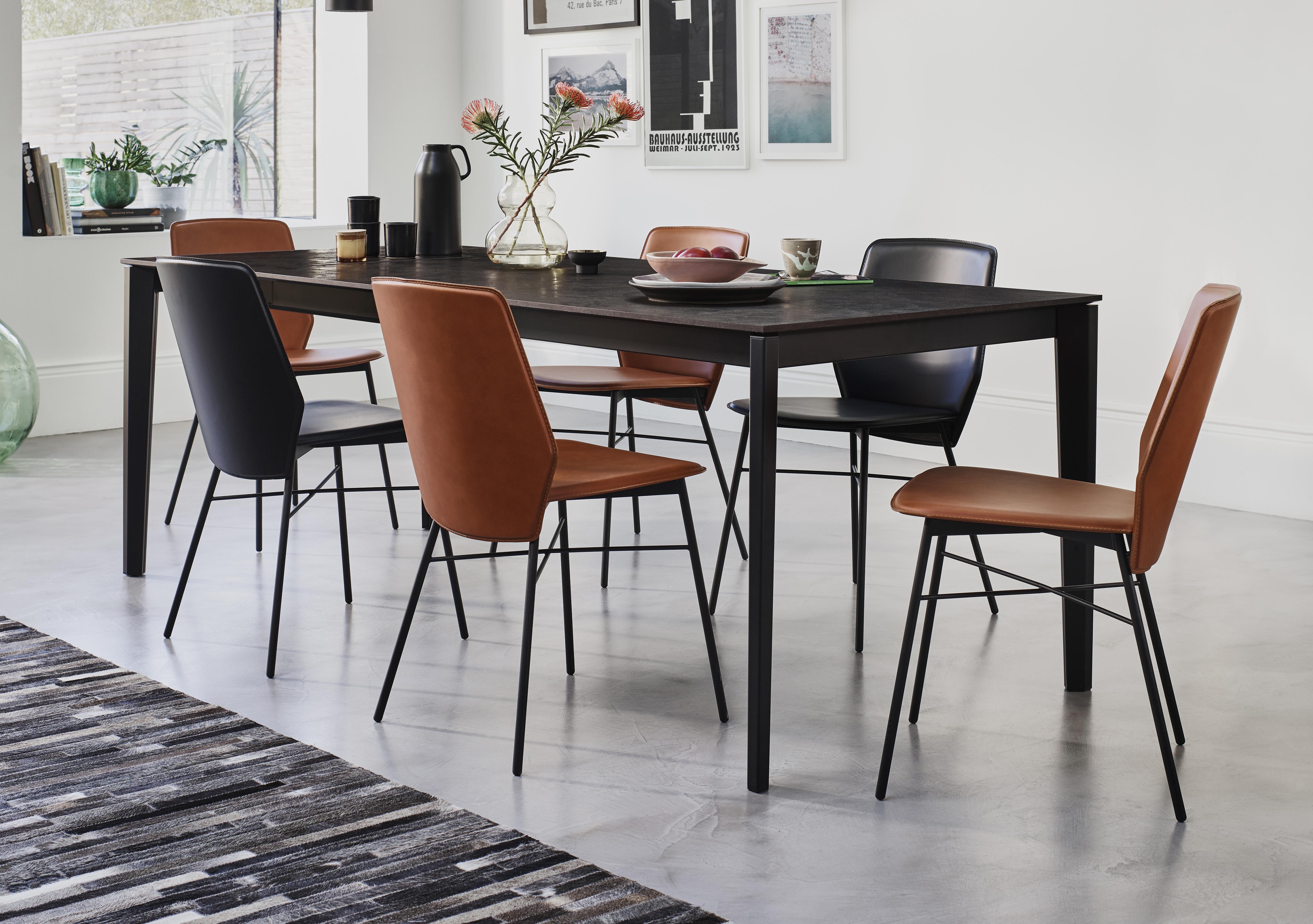 Pentagon Extending Dining Table with Oxide Bronze Top and 6 Sibilla Dining Chairs in  on Furniture Village