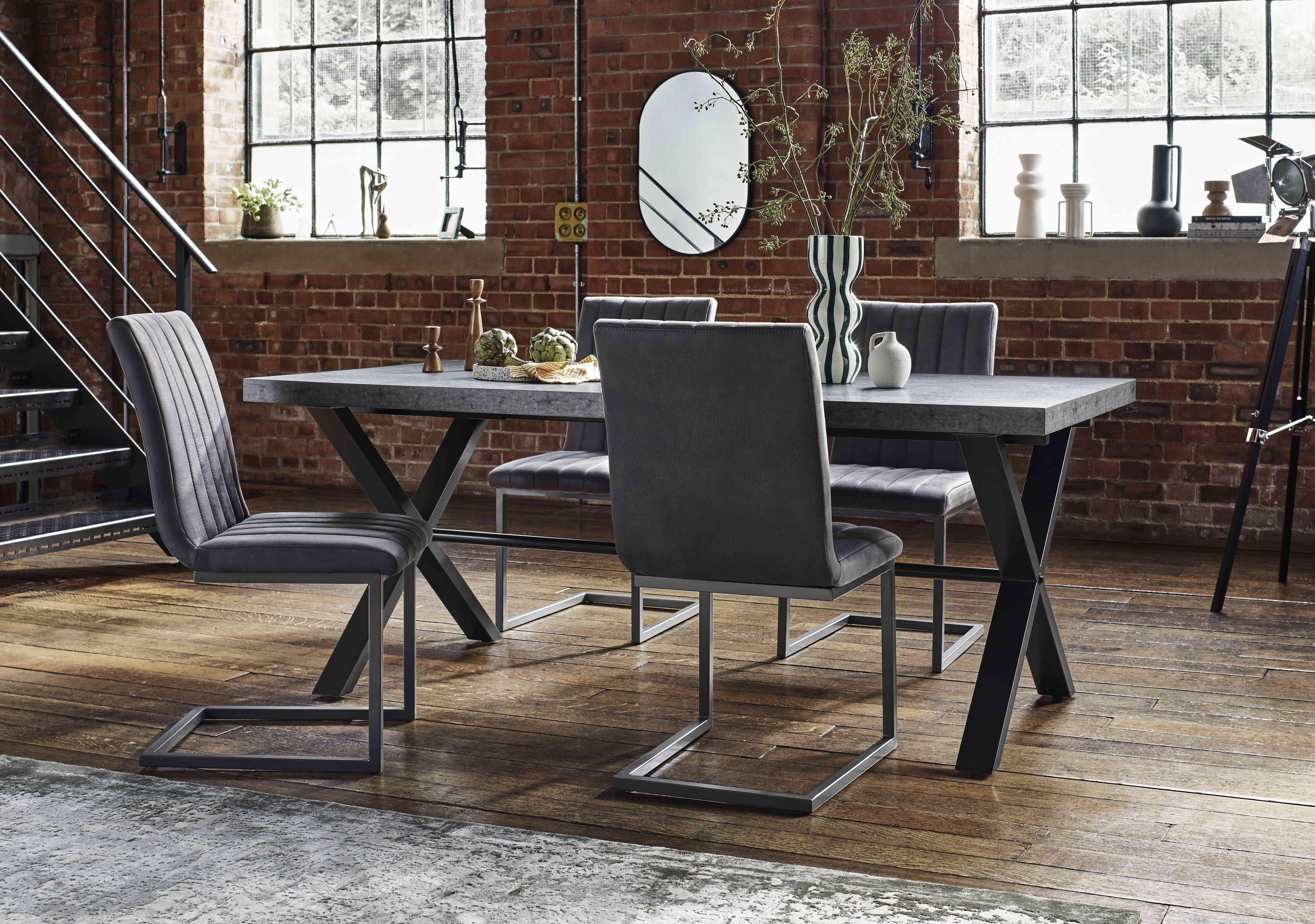 Moon Dining Table and 4 Cantilever Dining Chairs Dining Set in  on Furniture Village