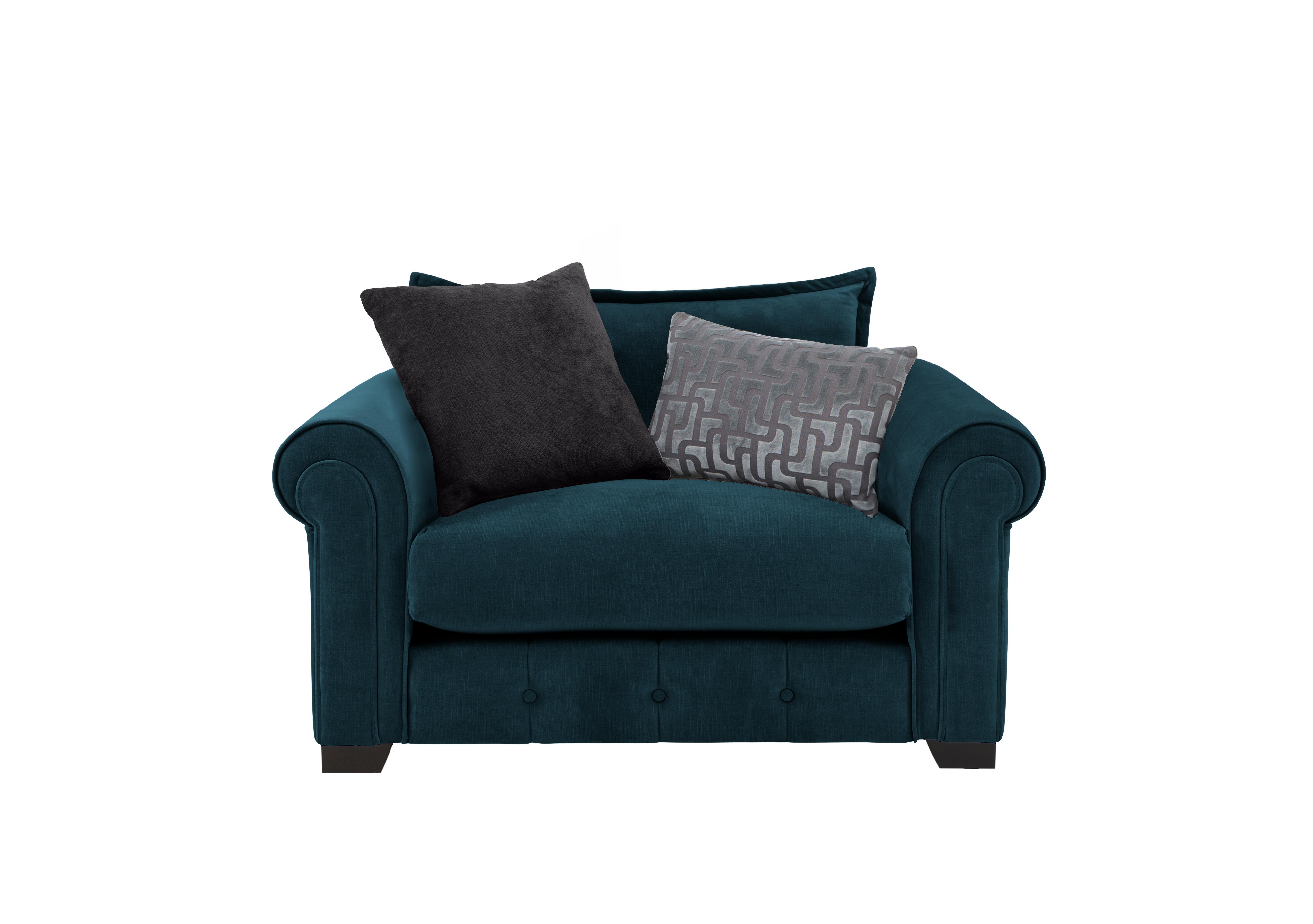 Sumptuous Fabric Snuggler Chair in Cham Teal Comina Self on Furniture Village