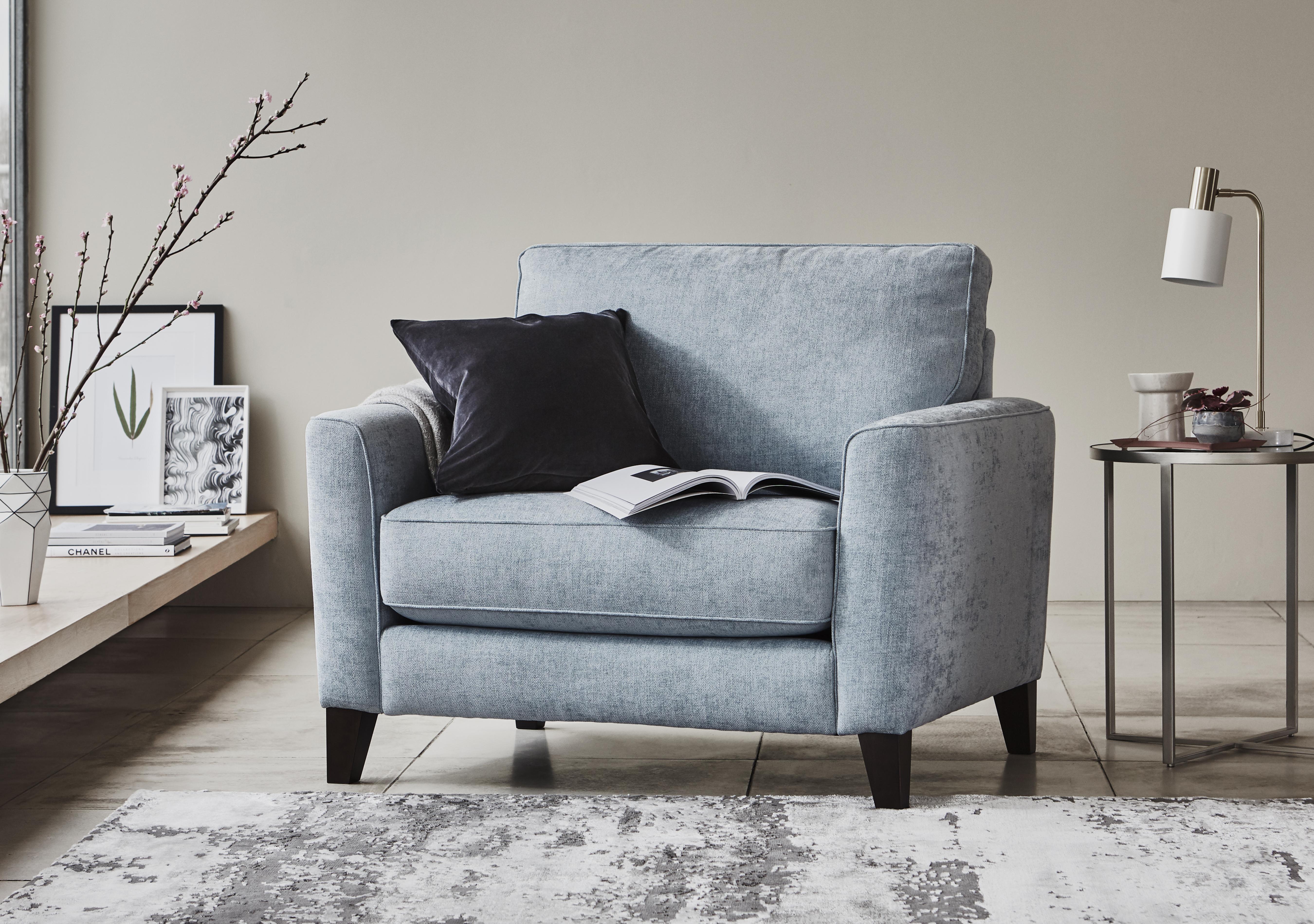 Brondby Fabric Cuddle Chair in  on Furniture Village