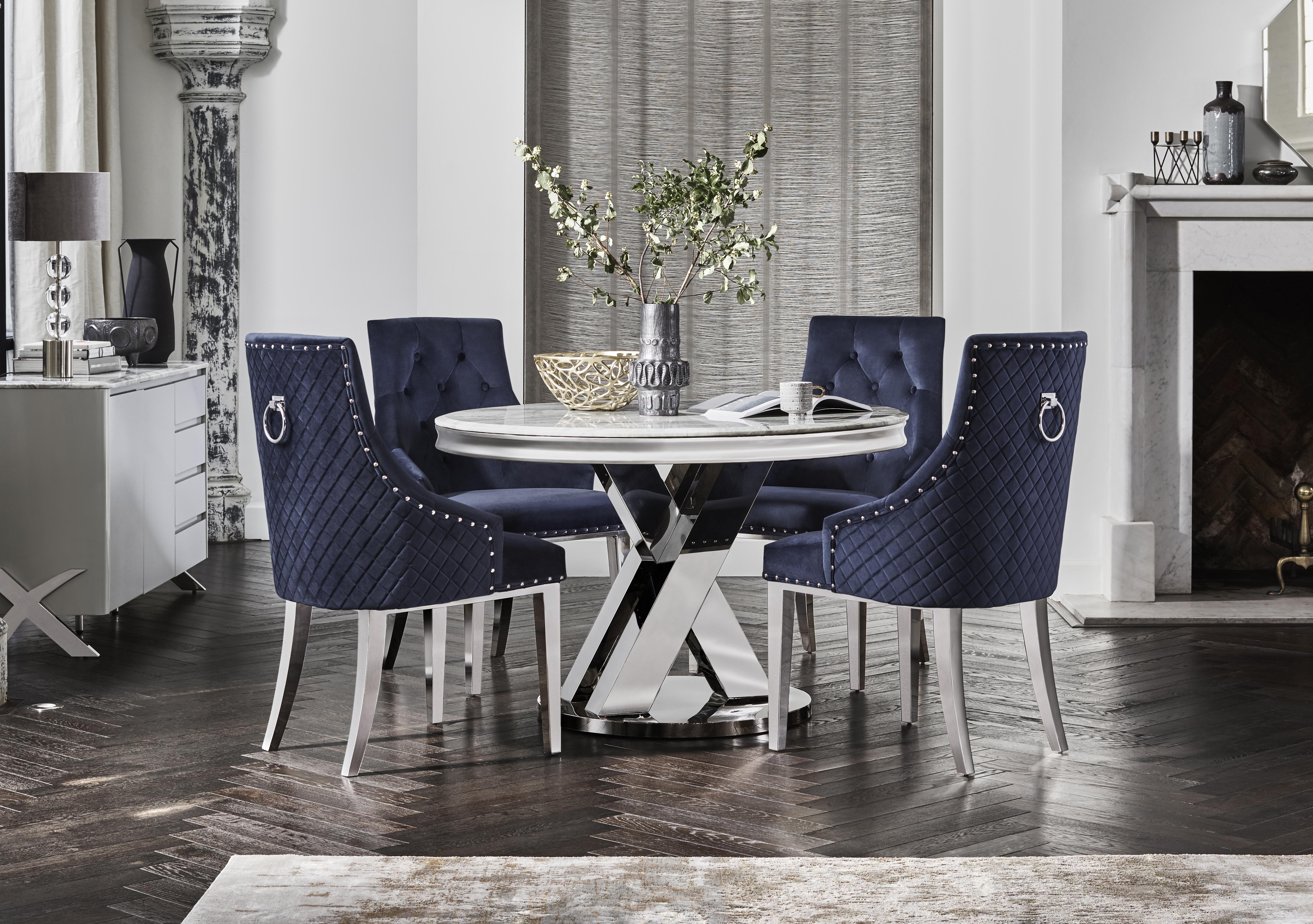 Dolce Round Dining Table and 4 Button Back Dining Chairs in  on Furniture Village