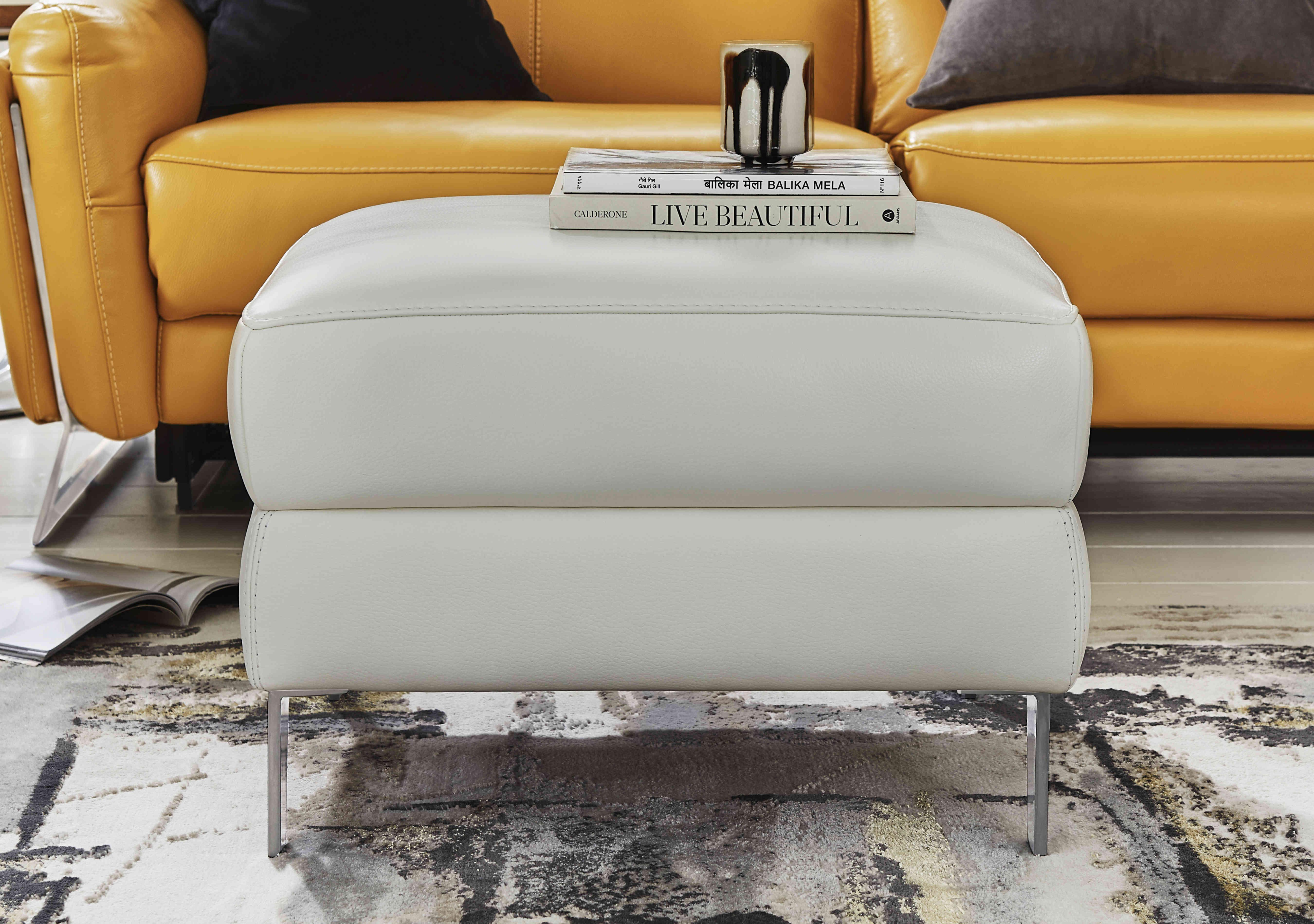 Amarilla Leather Storage Footstool in  on Furniture Village
