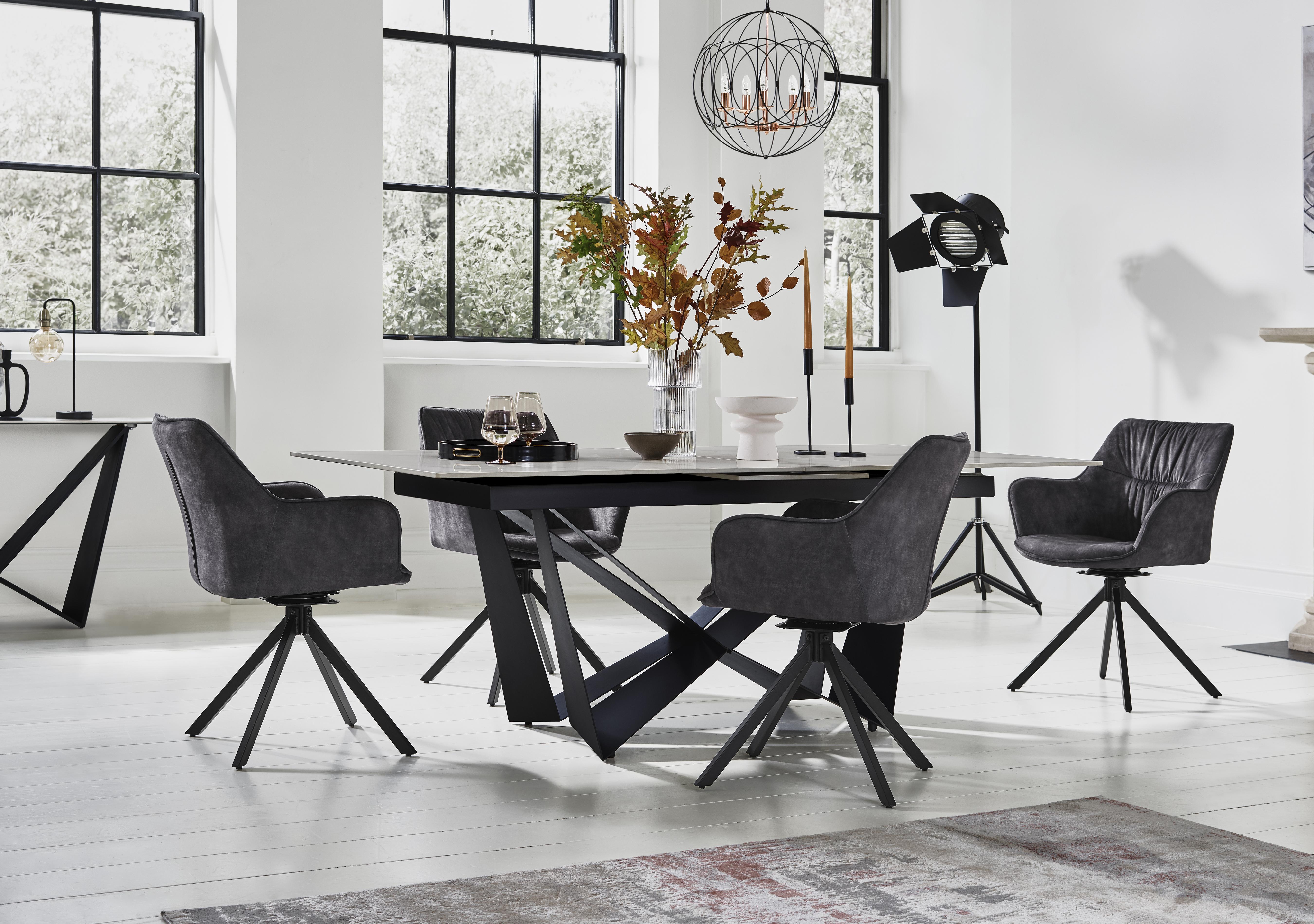 Marvel Black 200 cm Extending Dining Table and 4 Swivel Dining Chairs in  on Furniture Village