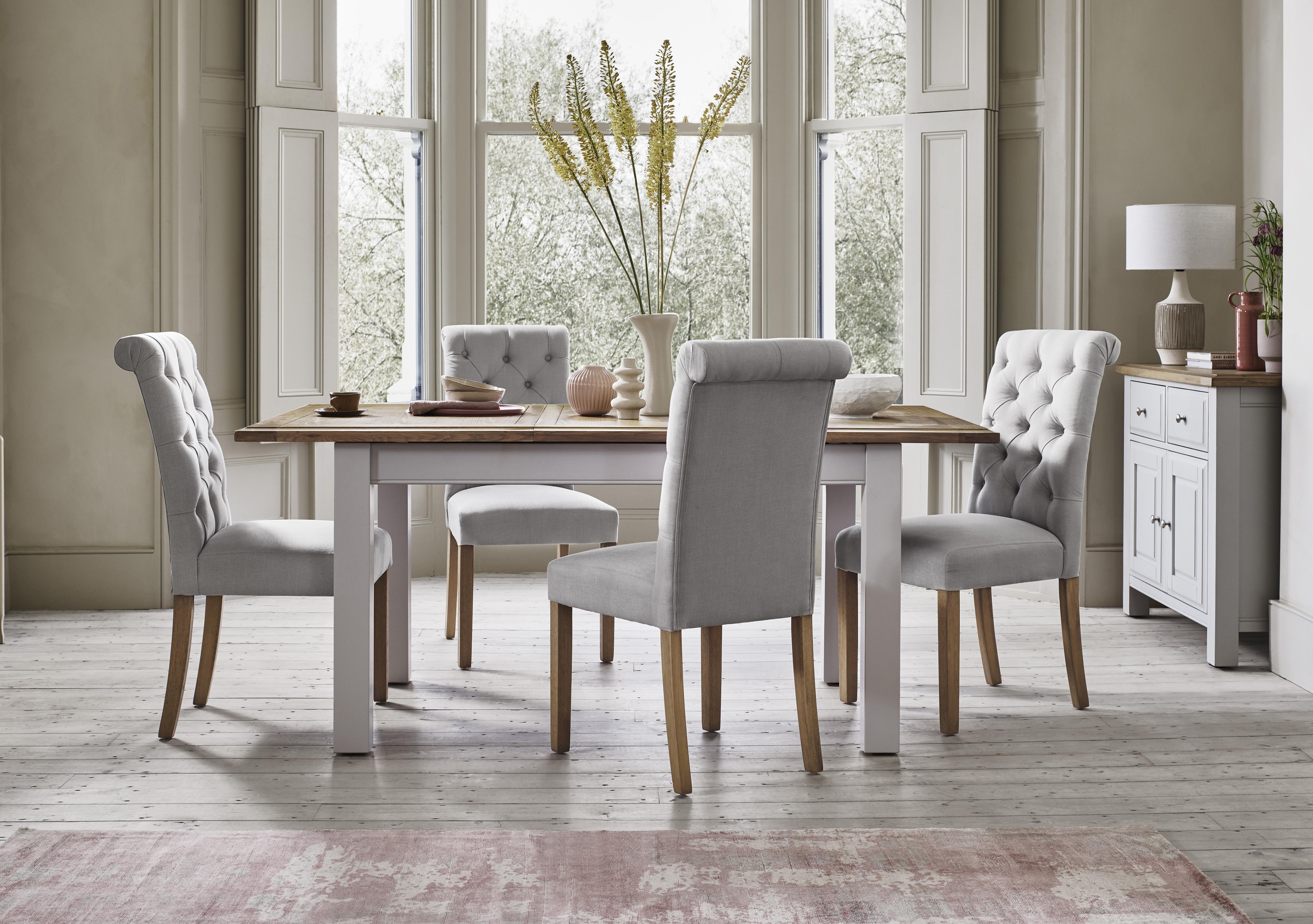 Hamilton Rectangular Extending Dining Table and 4 Button Back Dining Chairs in  on Furniture Village