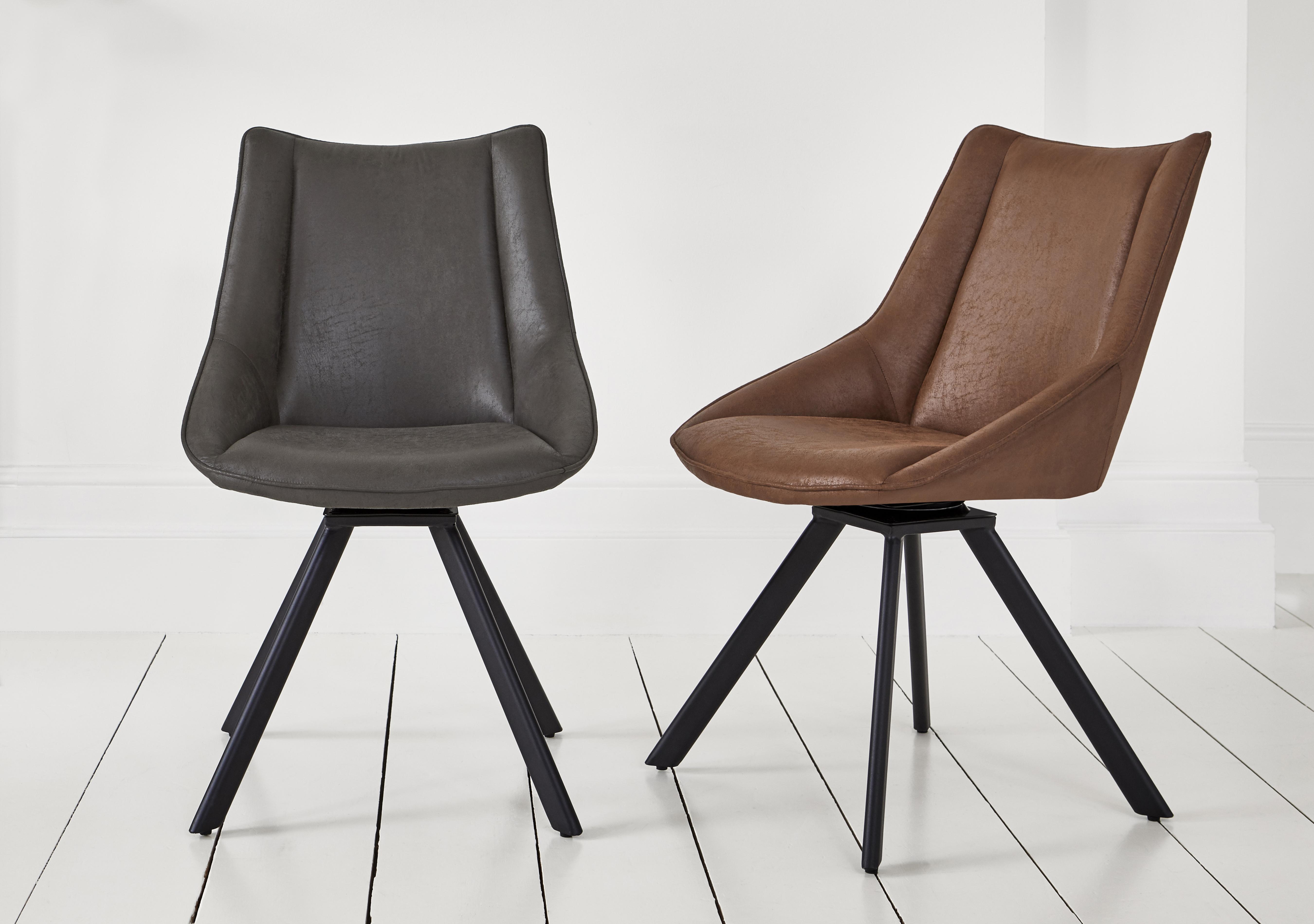 Lucio Set of 4 Faux Leather Swivel Dining Chairs in  on Furniture Village
