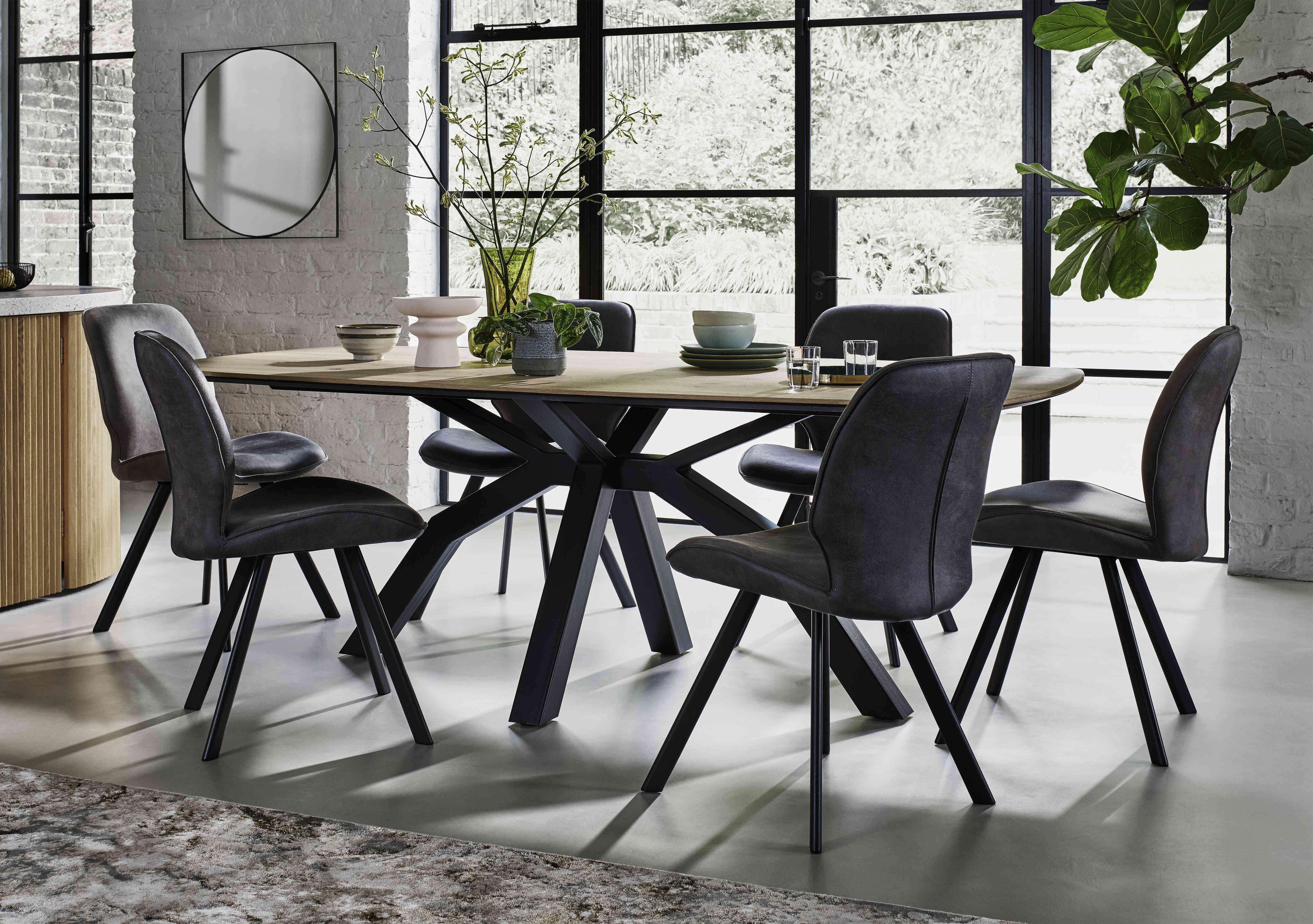 Montreal Dining Table with Spider Legs and 6 Semmi Chairs in  on Furniture Village