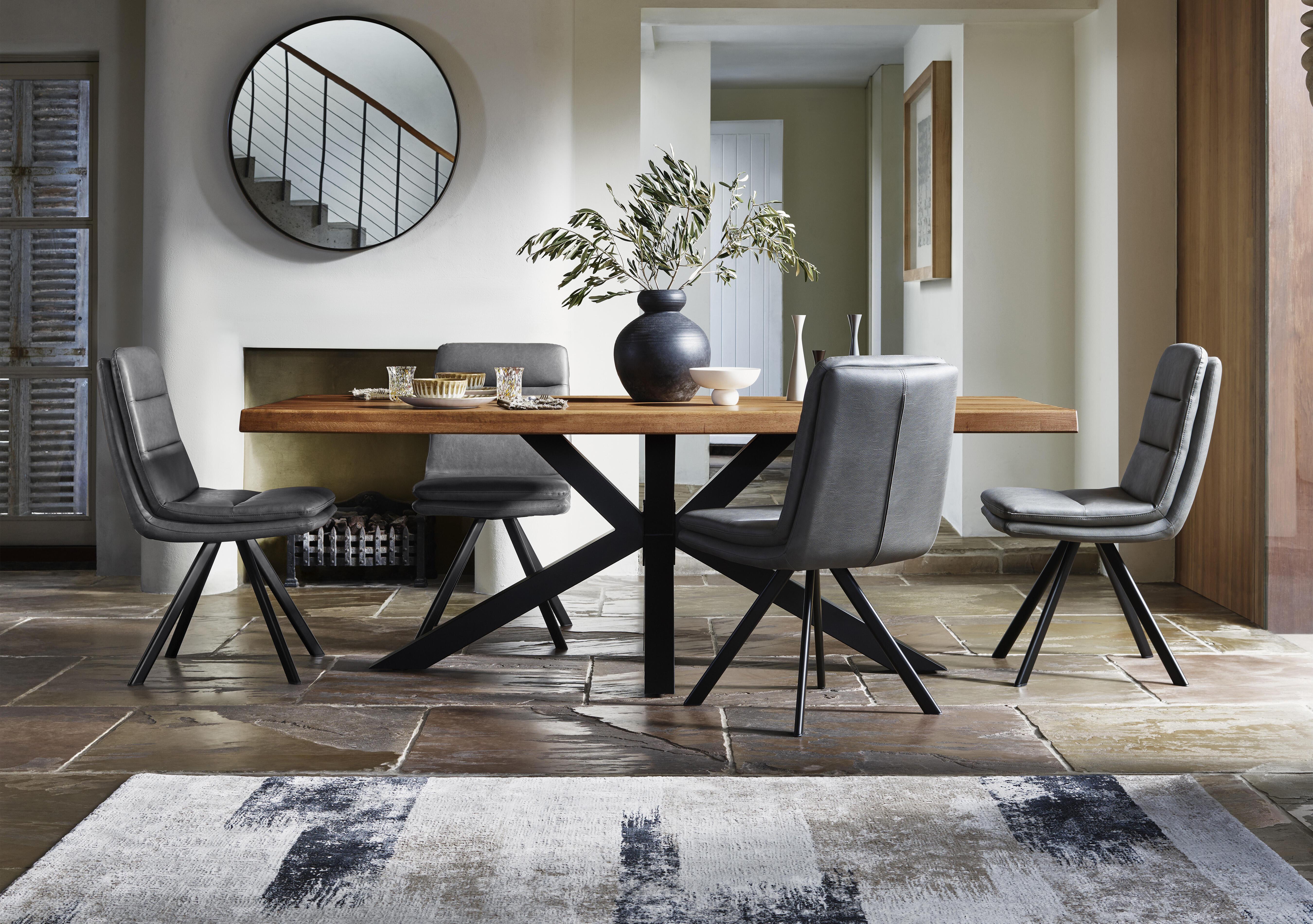 Njord Raw Edge Dining Table with Metal Star Base in  on Furniture Village