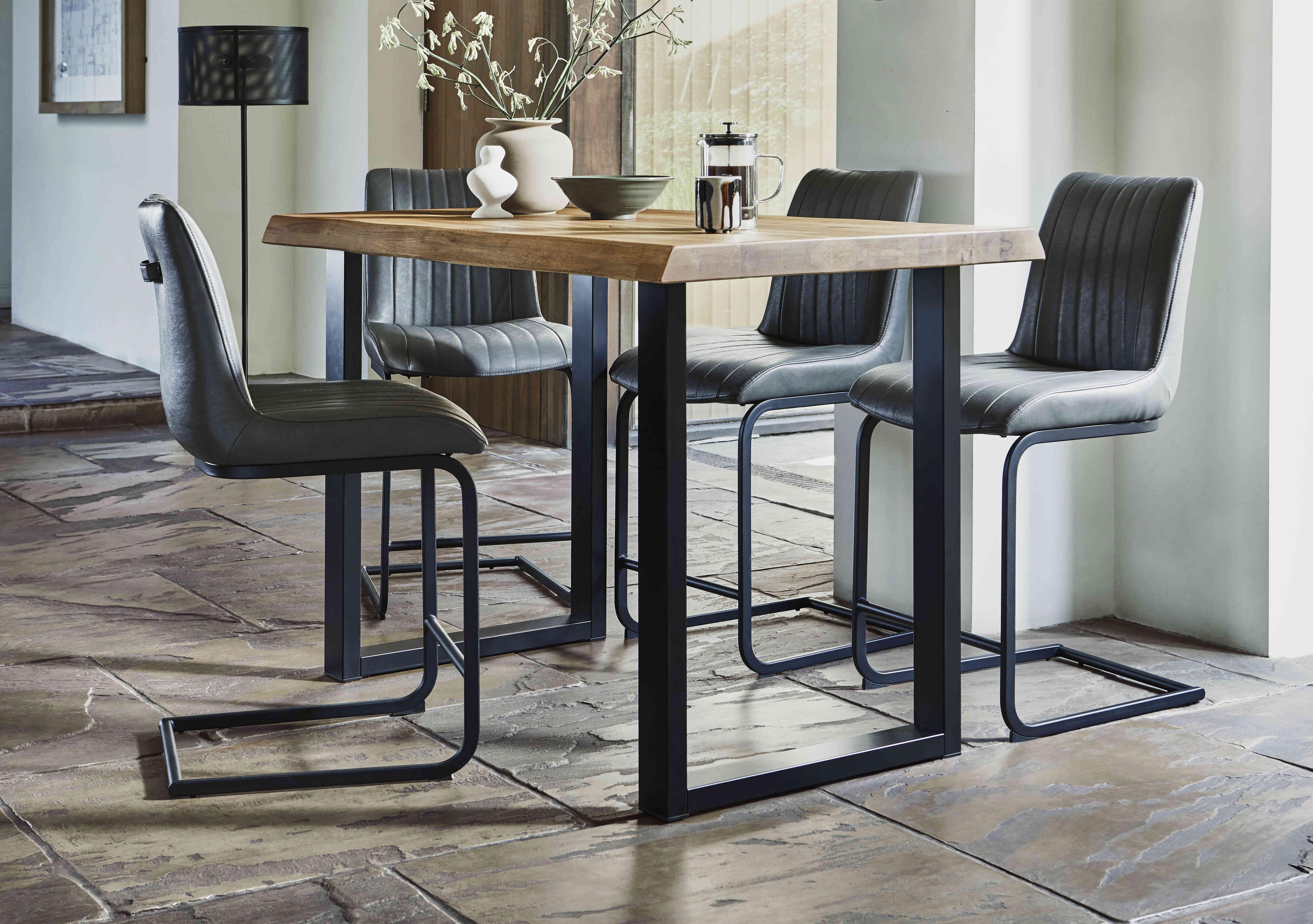 Compact Terra Raw Edge Bar Table with U-Shaped Legs and 4 Grey Terra Bar Stools in  on Furniture Village