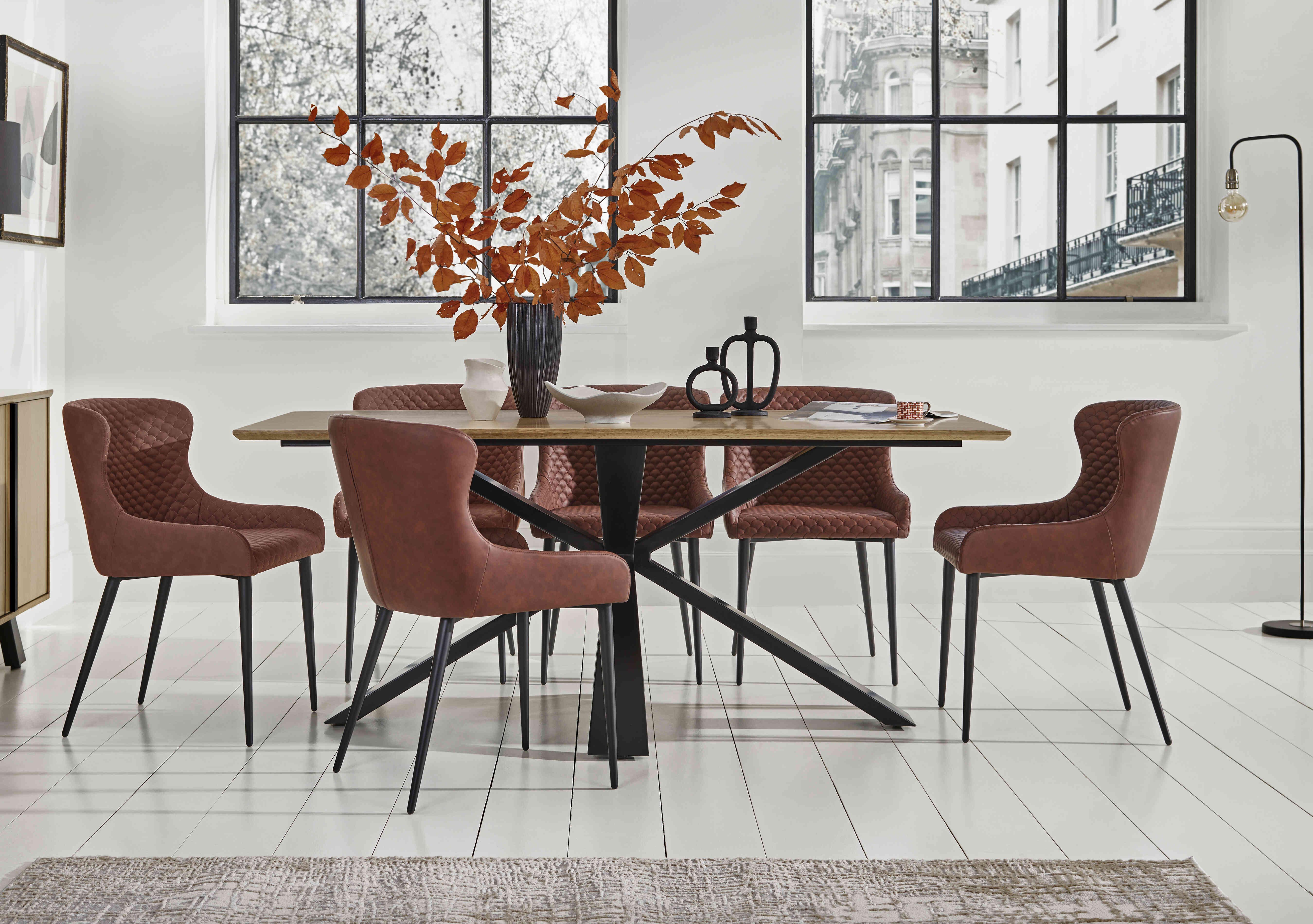 Hanoi Fixed Table with Metal Base and 6 Faux Leather Dining Chairs in  on Furniture Village
