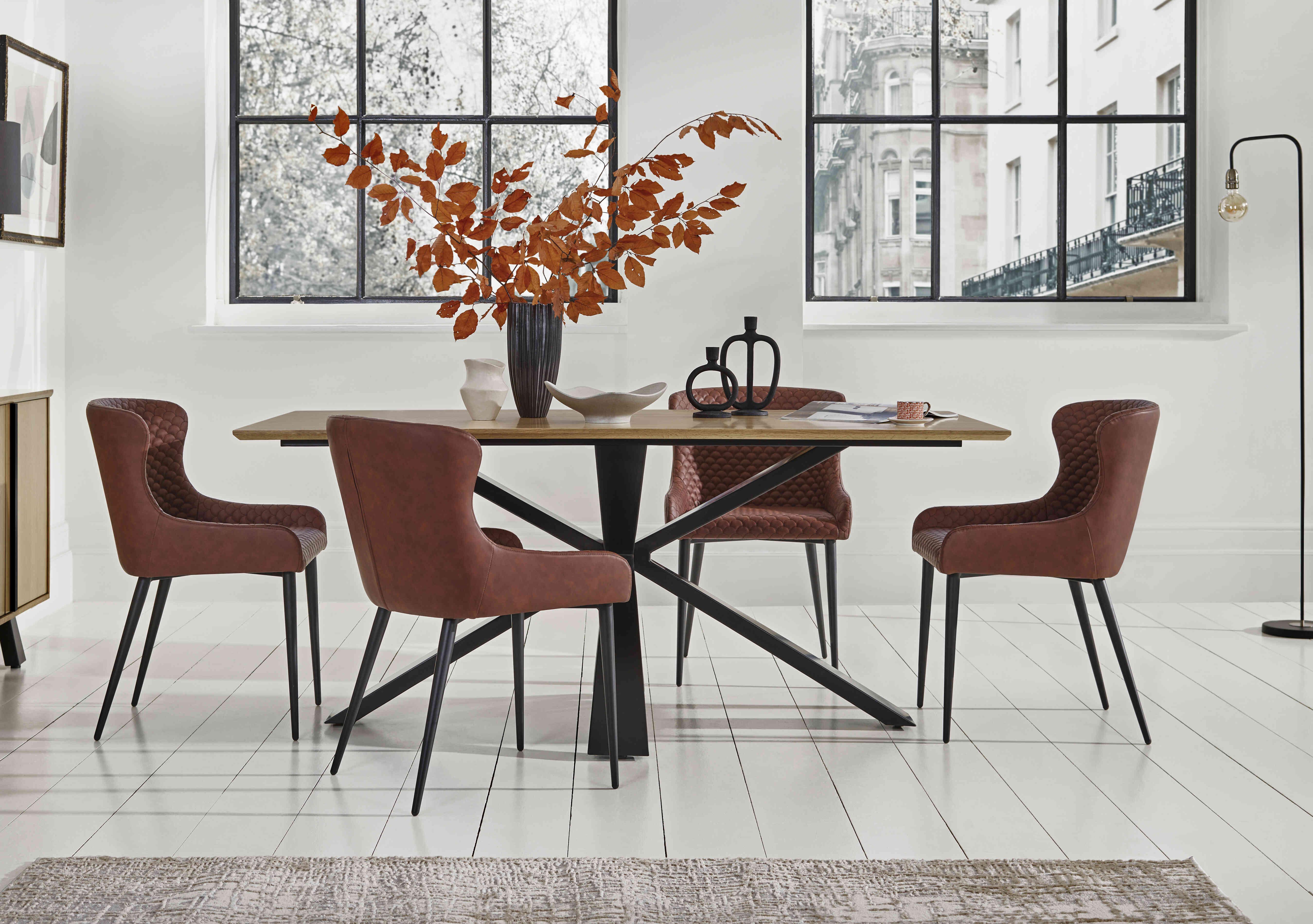 Hanoi Fixed Table with Metal Base and 4 Faux Leather Dining Chairs in  on Furniture Village