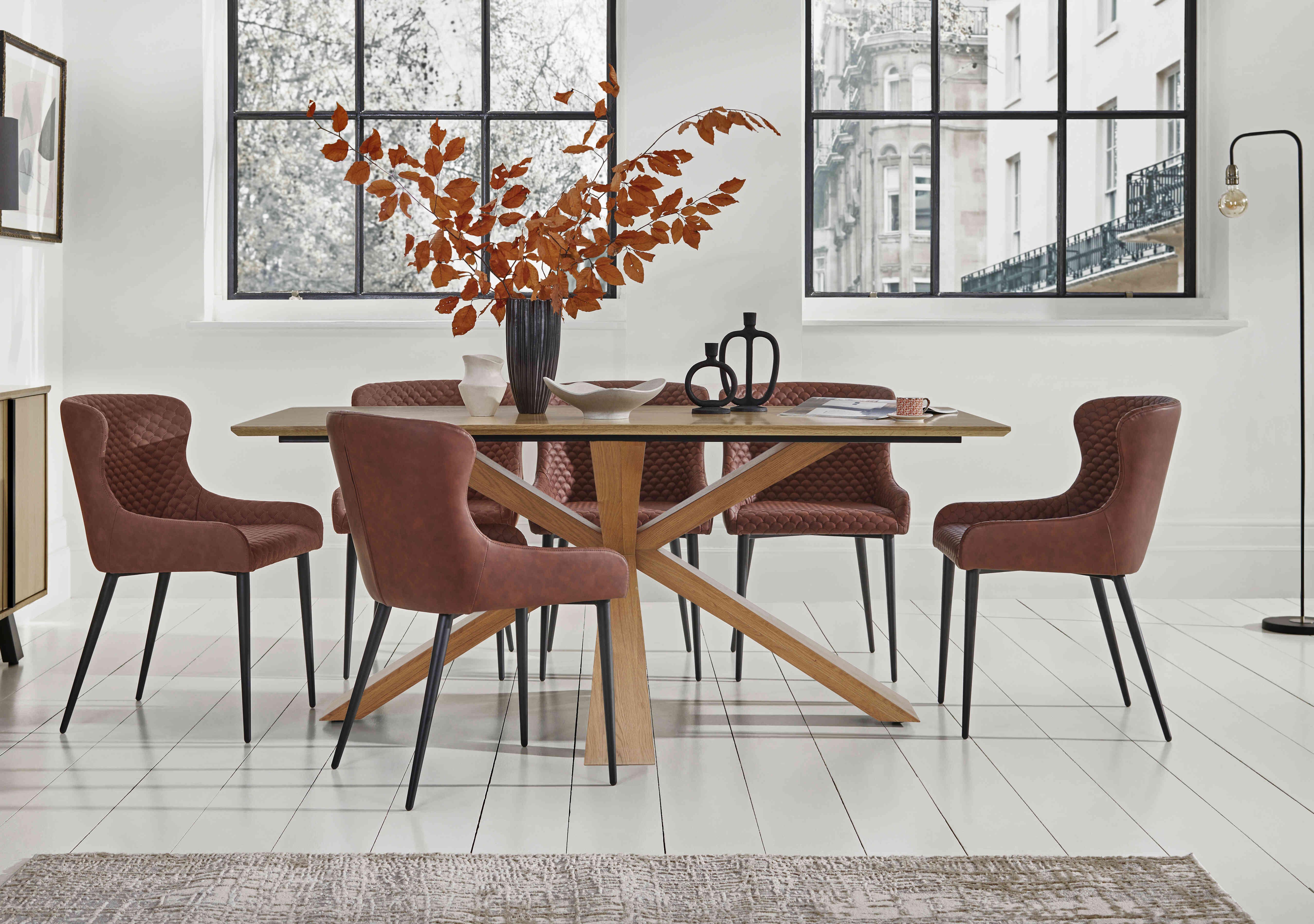 Hanoi Fixed Table with Wooden Base and 6 Faux Leather Dining Chairs in  on Furniture Village