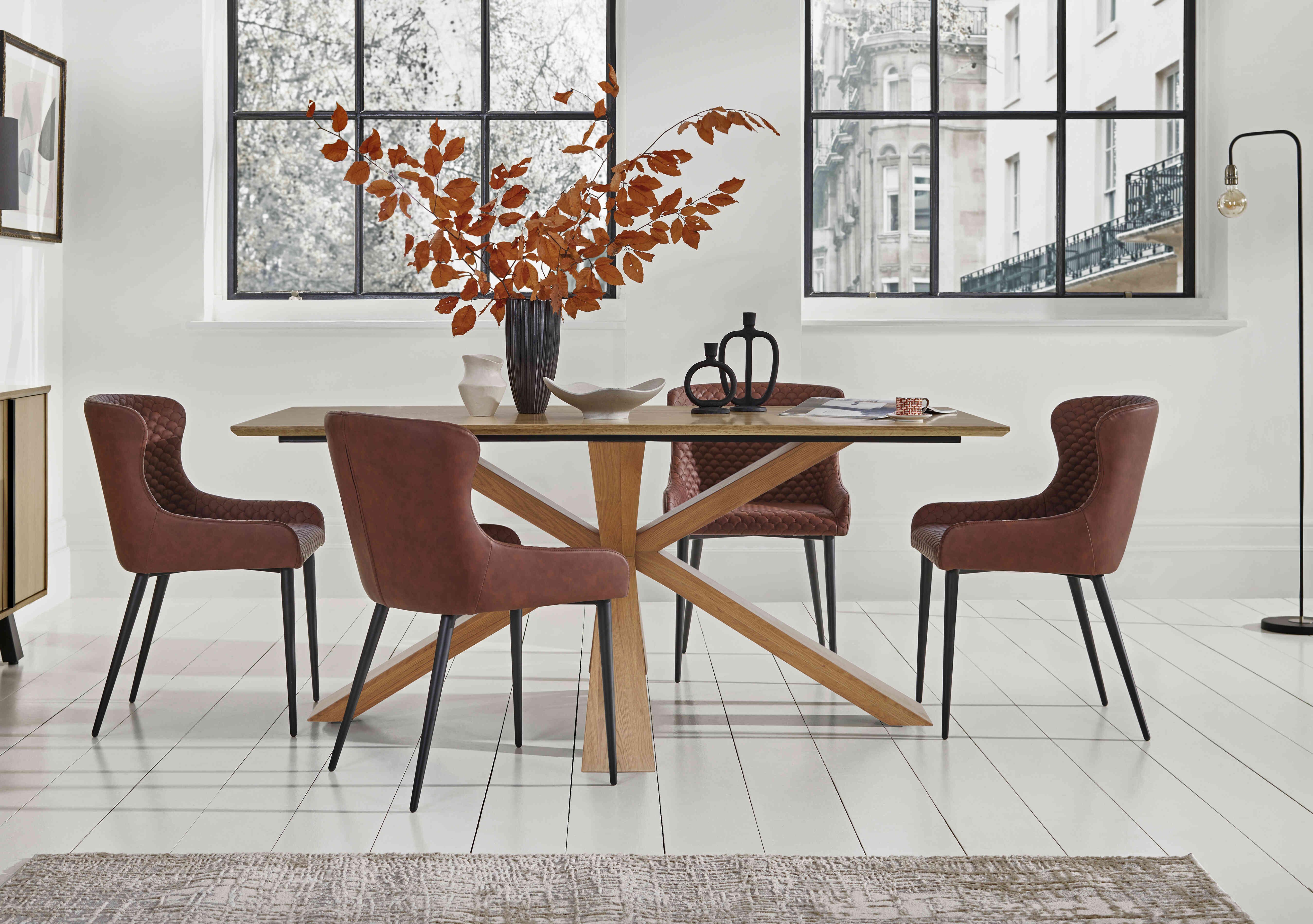 Hanoi Fixed Table with Wooden Base and 4 Faux Leather Dining Chairs in  on Furniture Village