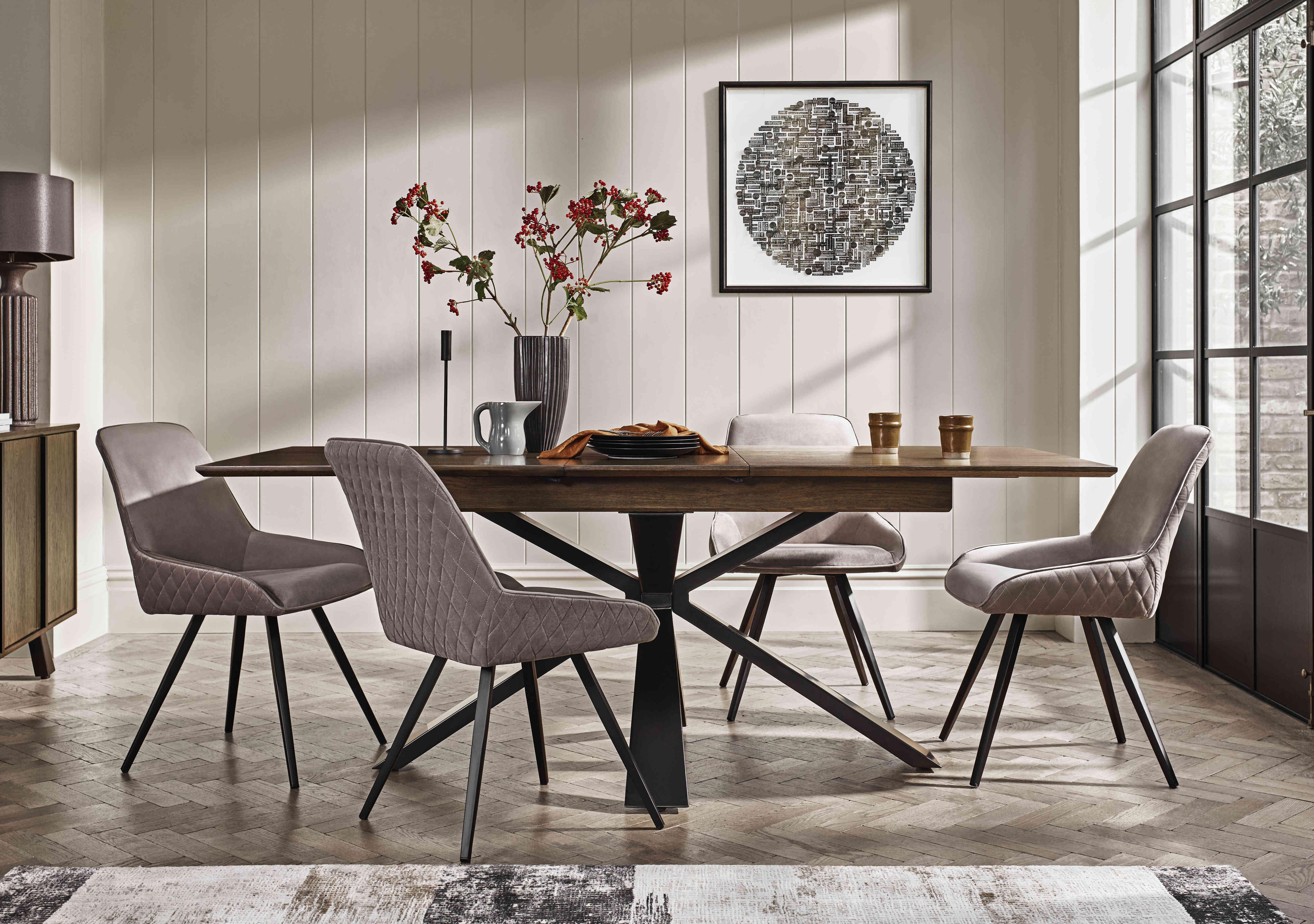 Saigon Extending Table with Metal Base and 4 Velvet Dining Chairs in  on Furniture Village