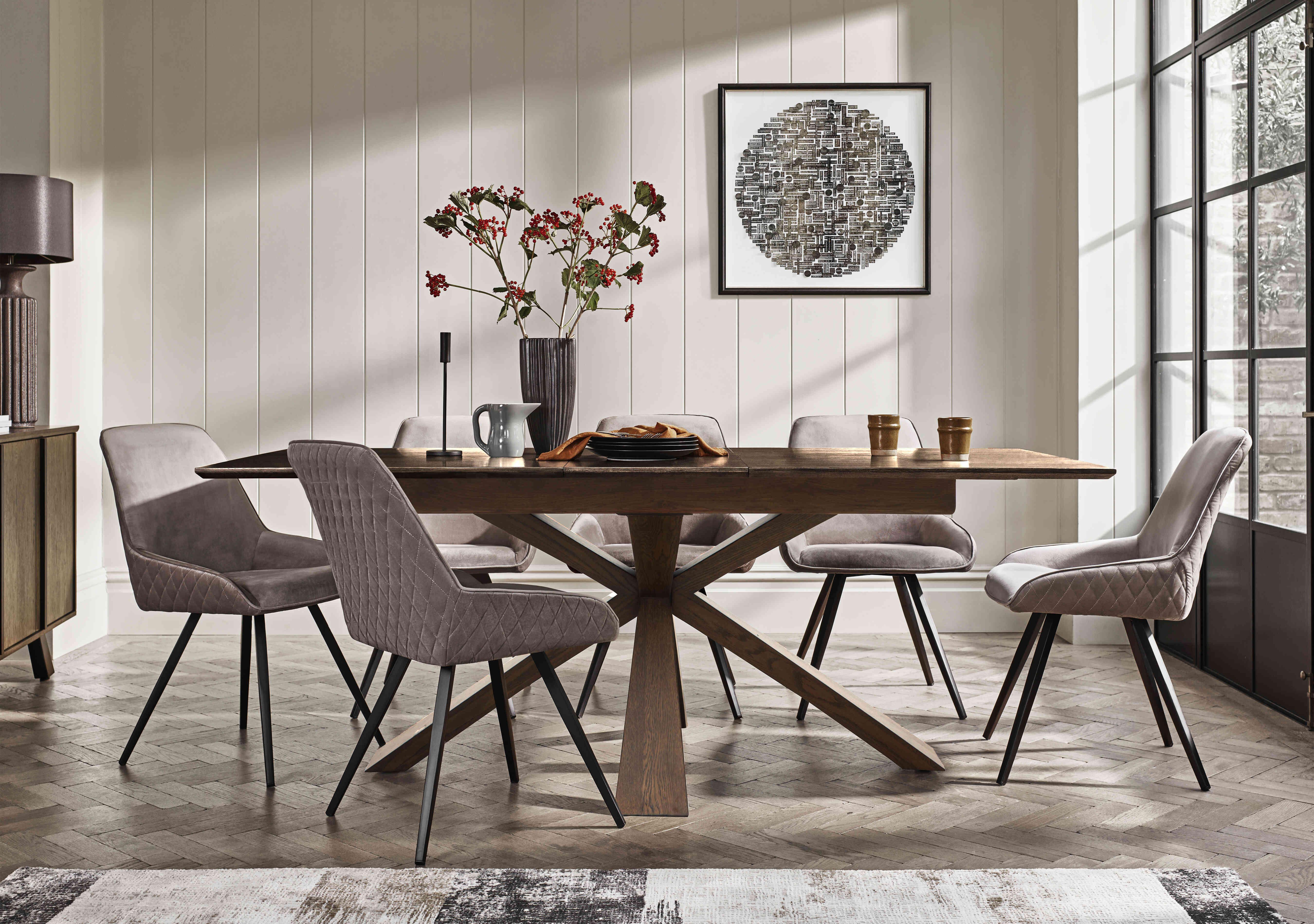 Saigon Extending Table with Wooden Base and 6 Velvet Dining Chairs in  on Furniture Village