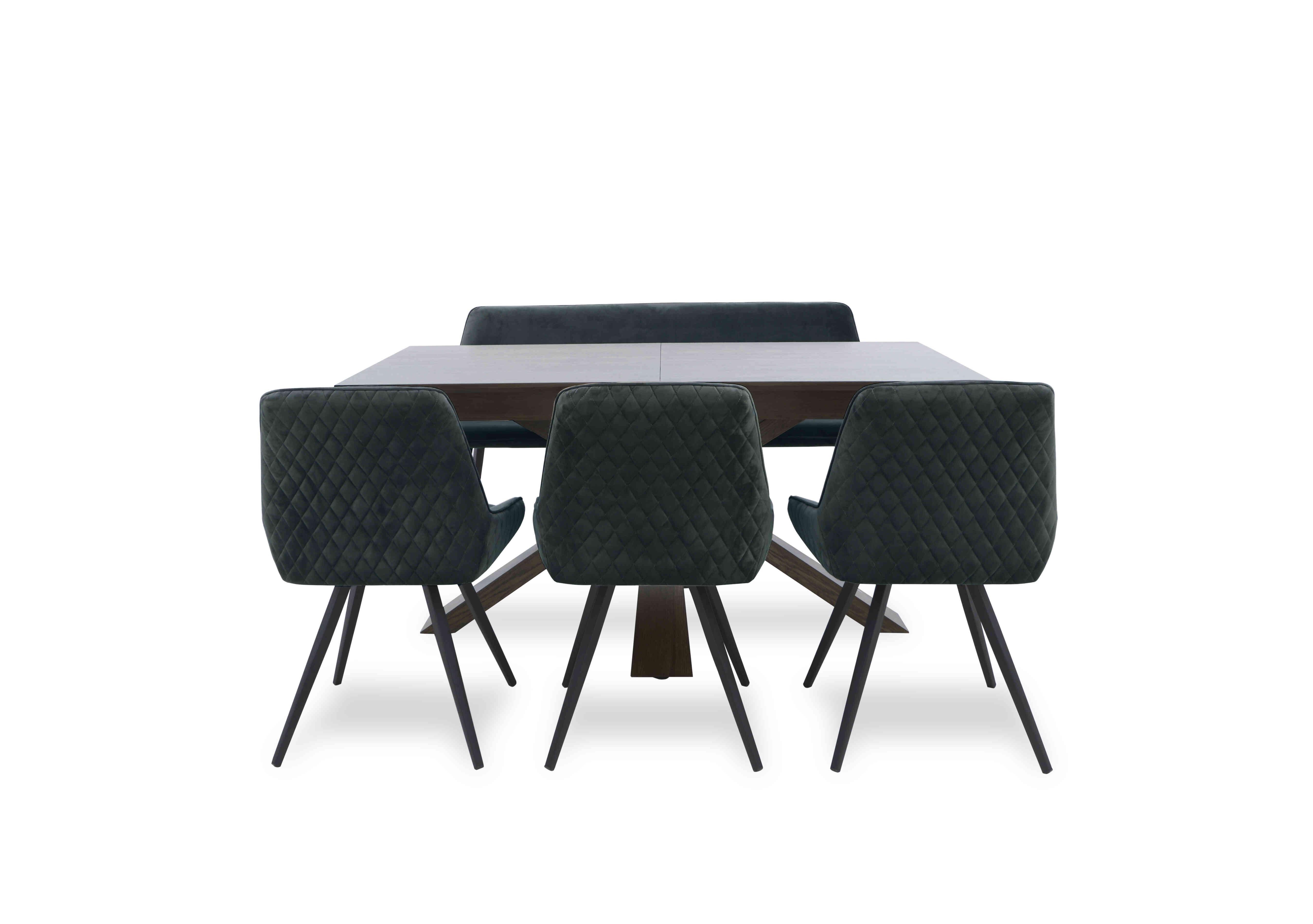 Saigon Extending Table with Wooden Base and 3 Velvet Dining Chairs and a Dining Bench in Forest Green Velvet on Furniture Village