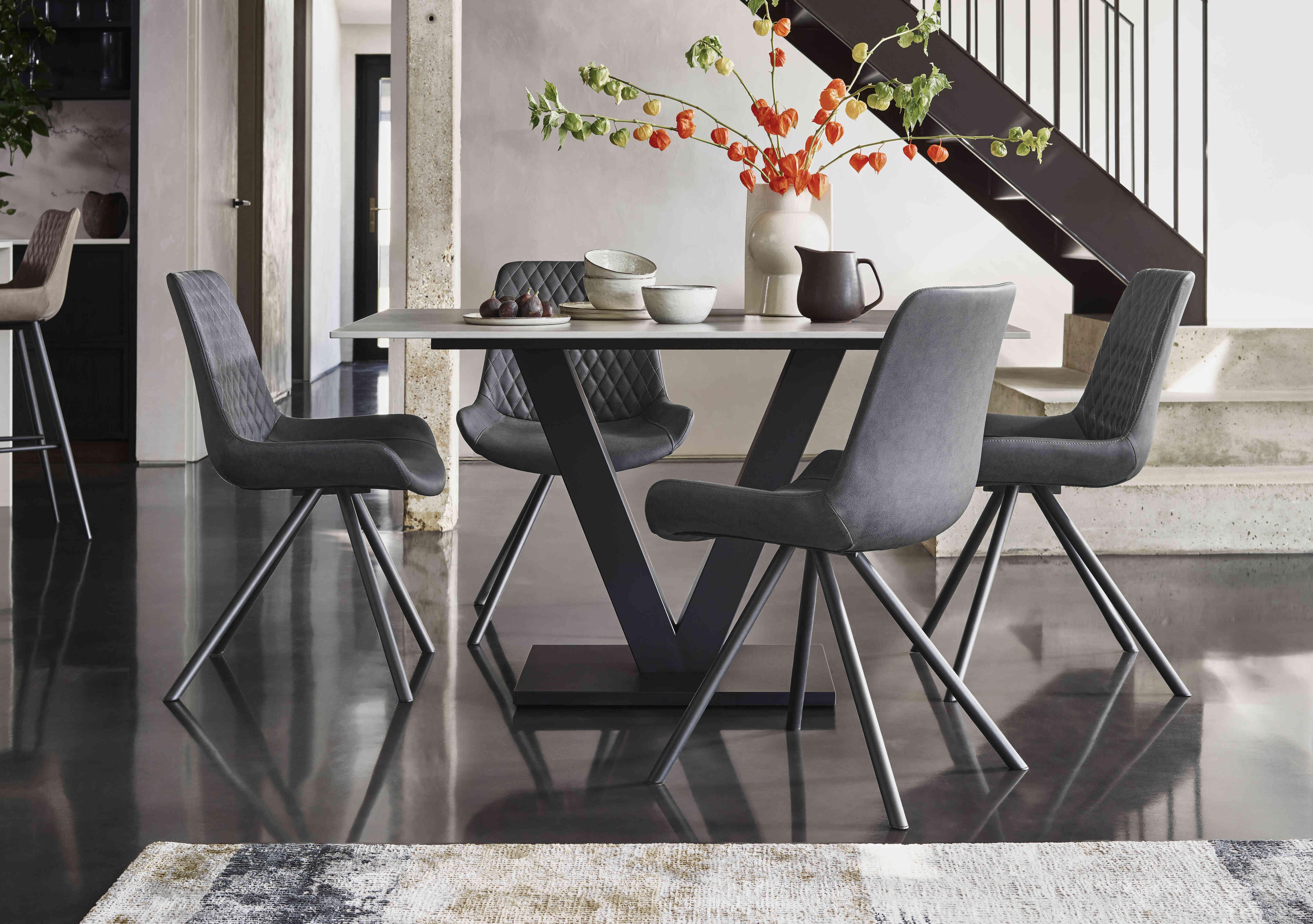 Ion Fixed Dining Table with 4 Faux Leather Dining Chairs in  on Furniture Village