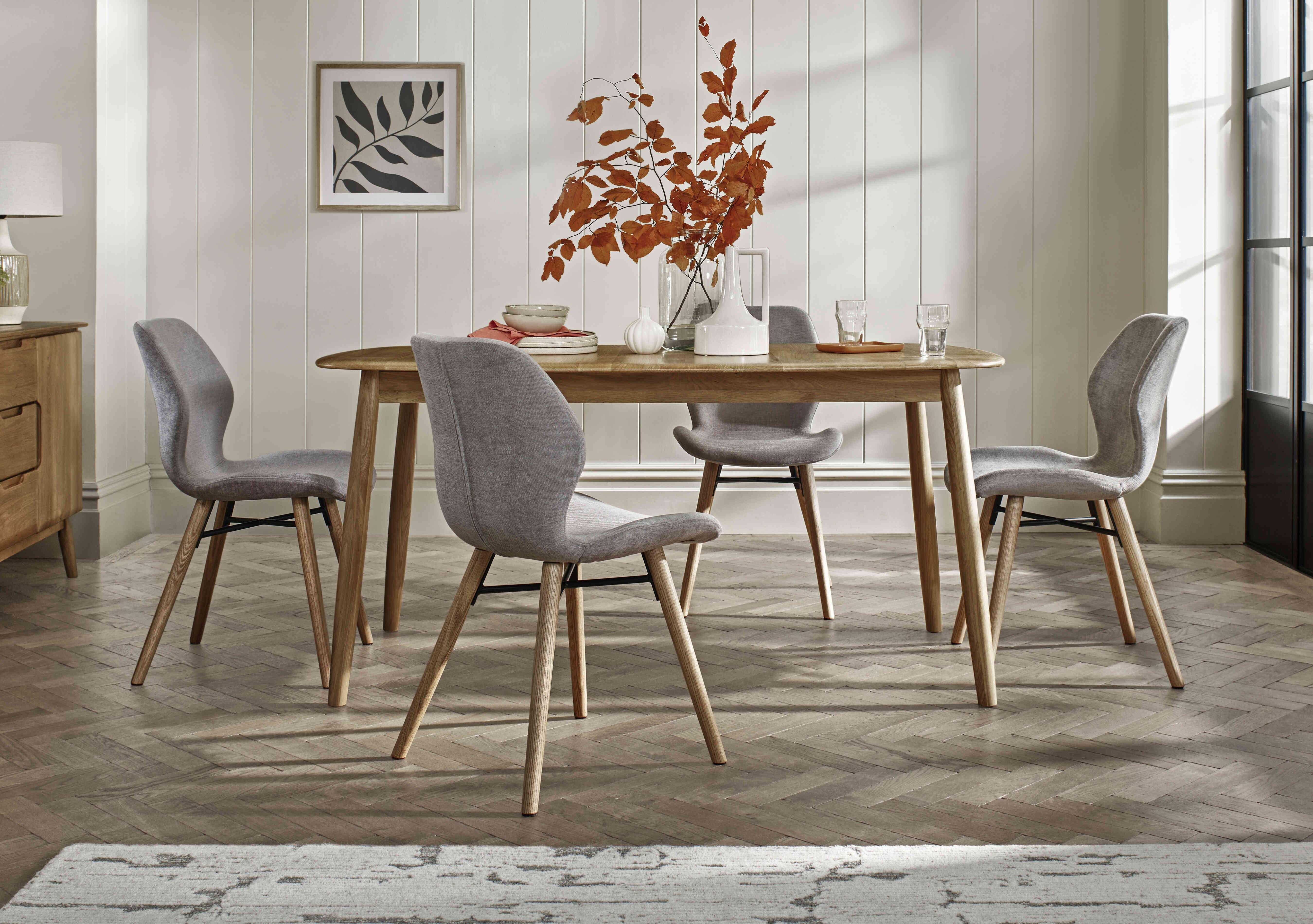 Stockholm Fixed Dining Table with 4 Upholstered Dining Chairs in  on Furniture Village
