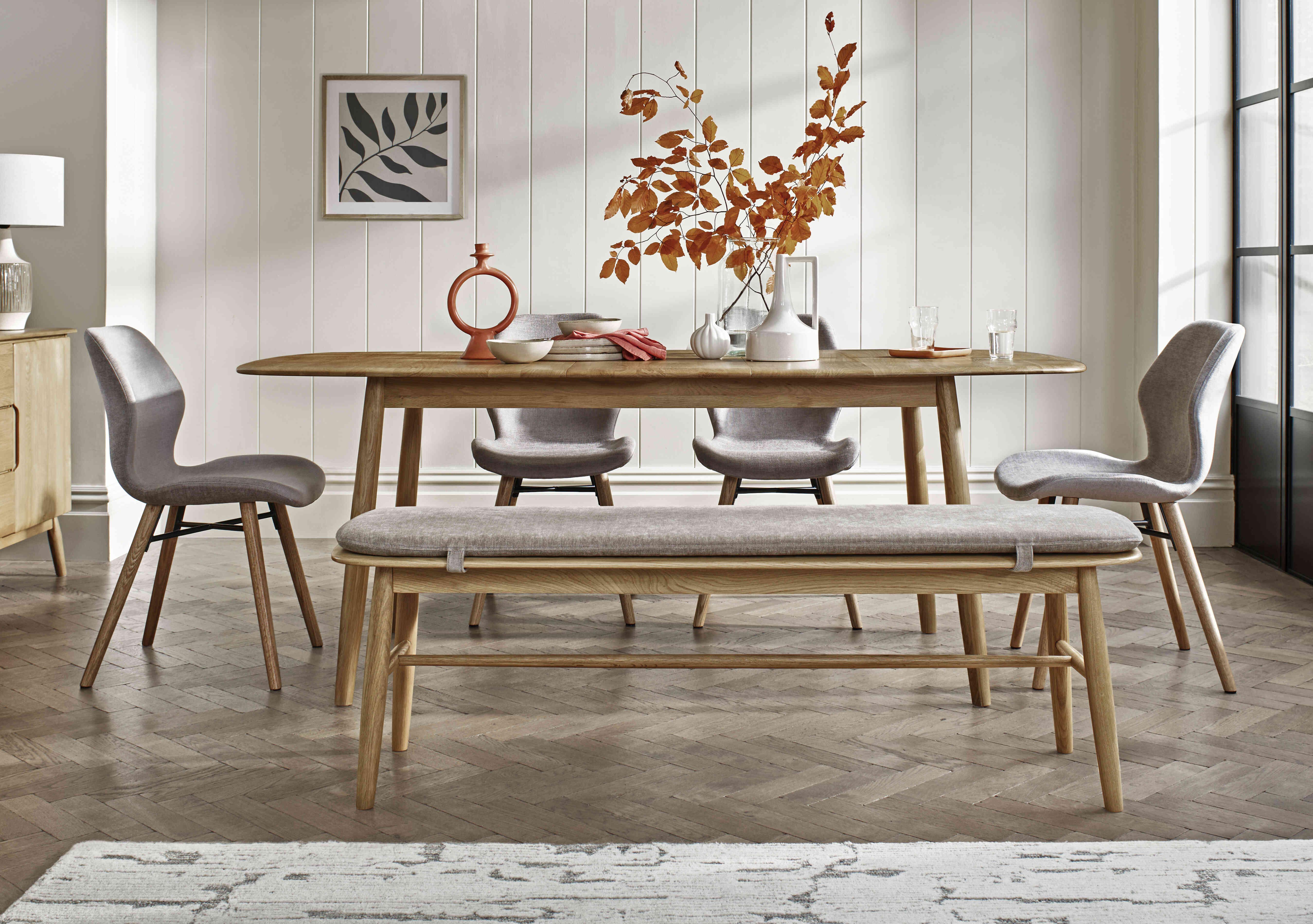Stockholm Extending Dining Table with 4 Upholstered Dining Chairs and a Dining Bench in  on Furniture Village