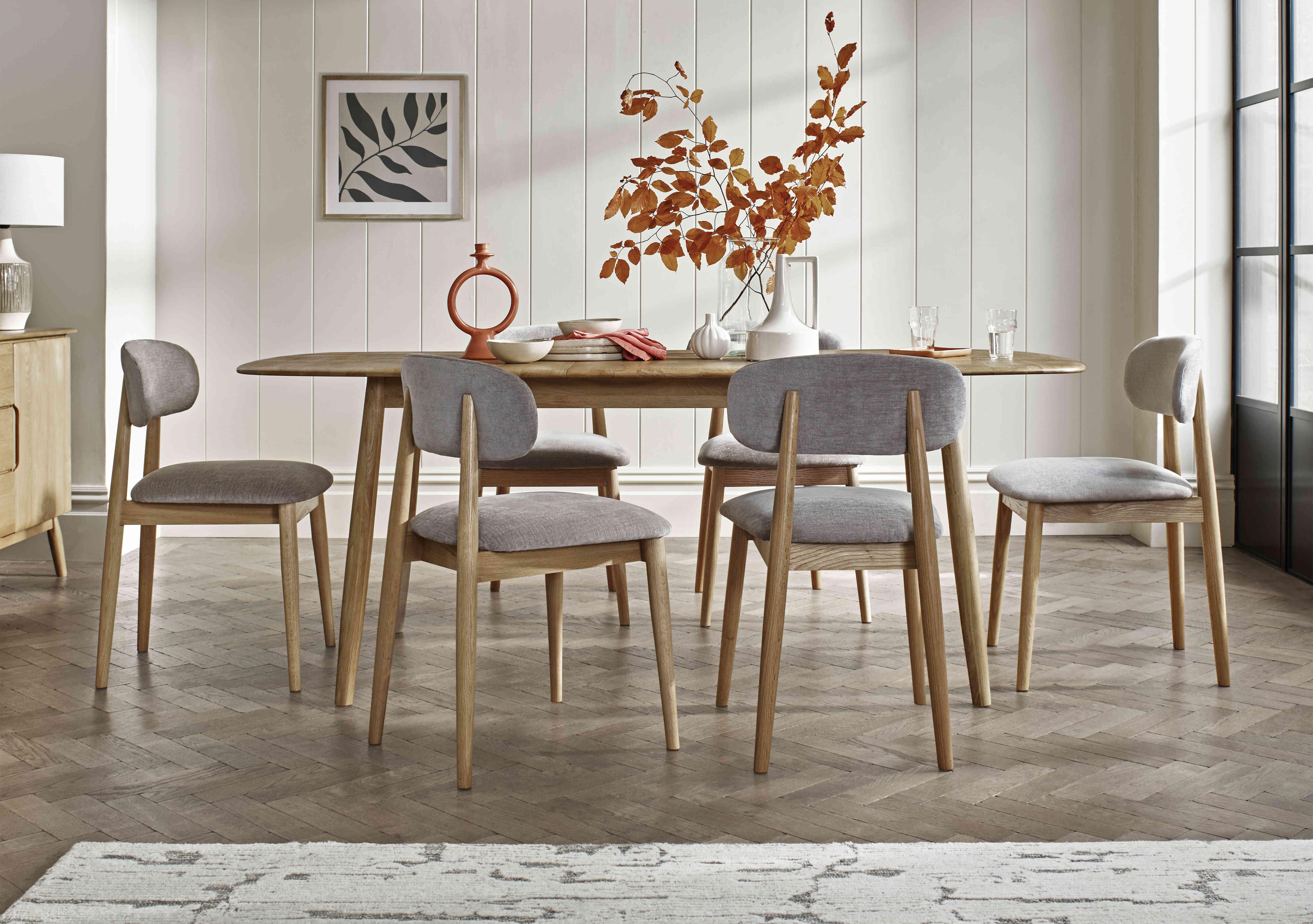 Stockholm Extending Dining Table with 6 Wooden Dining Chairs in  on Furniture Village