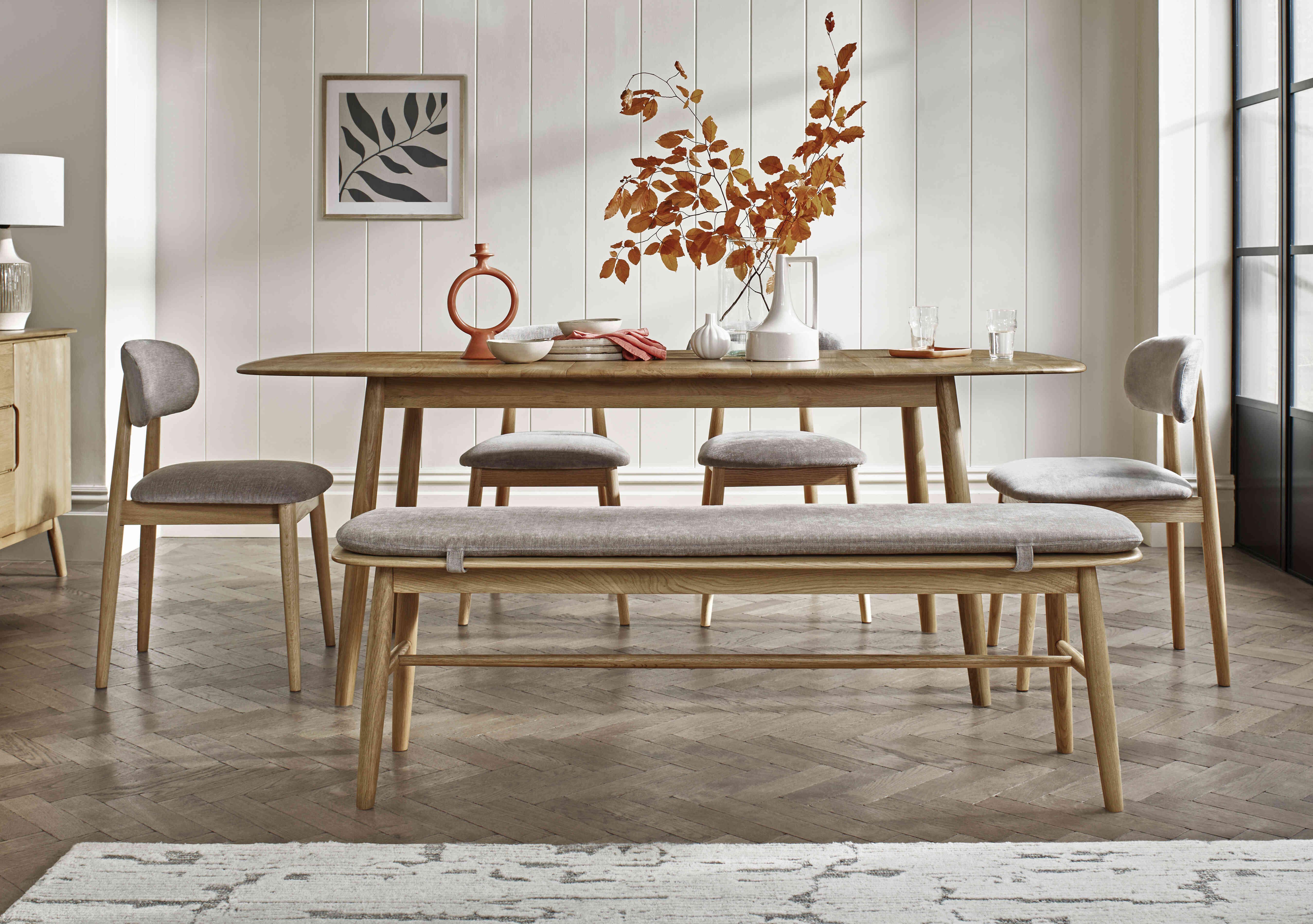 Stockholm Extending Dining Table with 4 Wooden Dining Chairs and a Dining Bench in  on Furniture Village