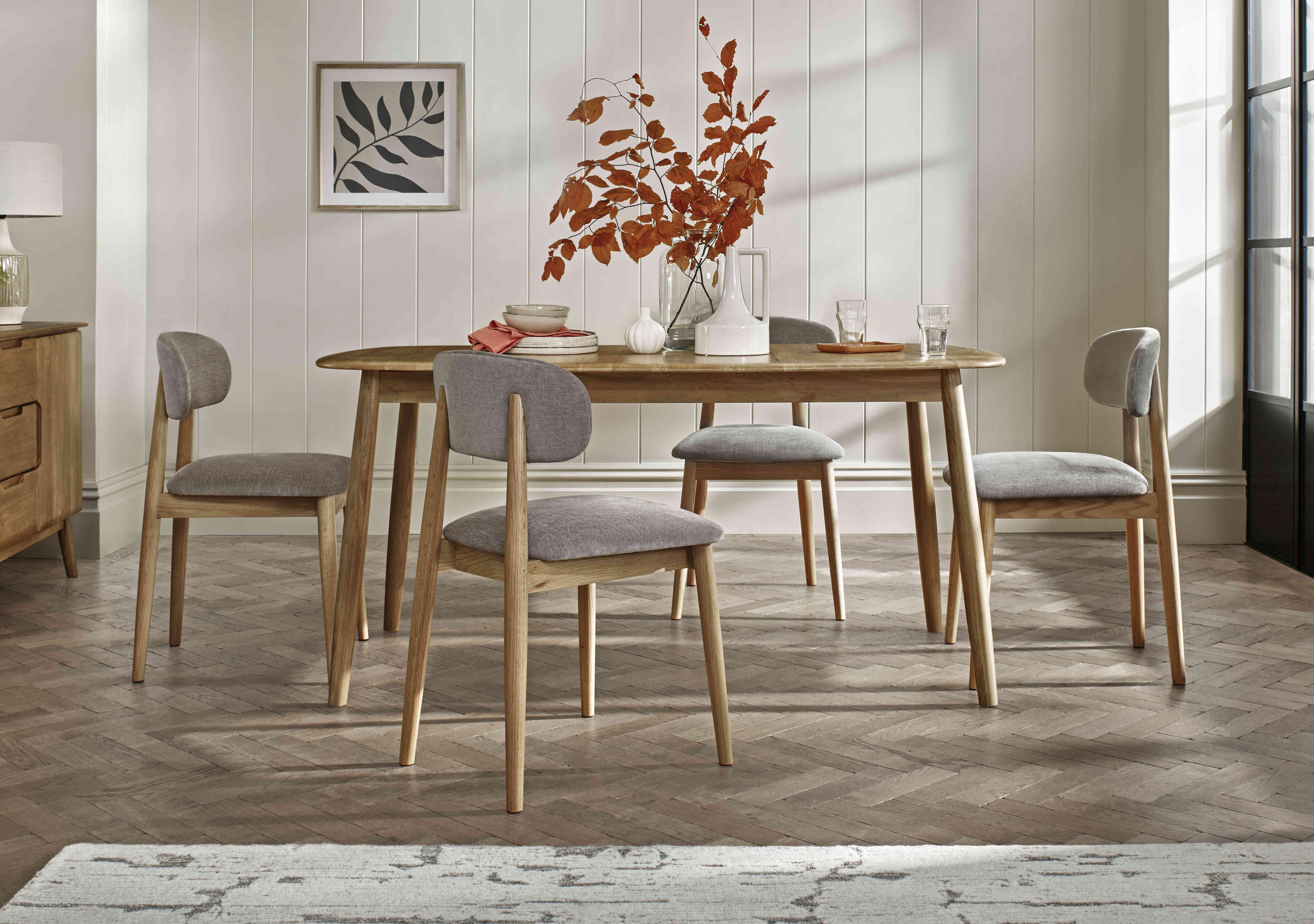 Stockholm Fixed Dining Table with 4 Wooden Dining Chairs in  on Furniture Village