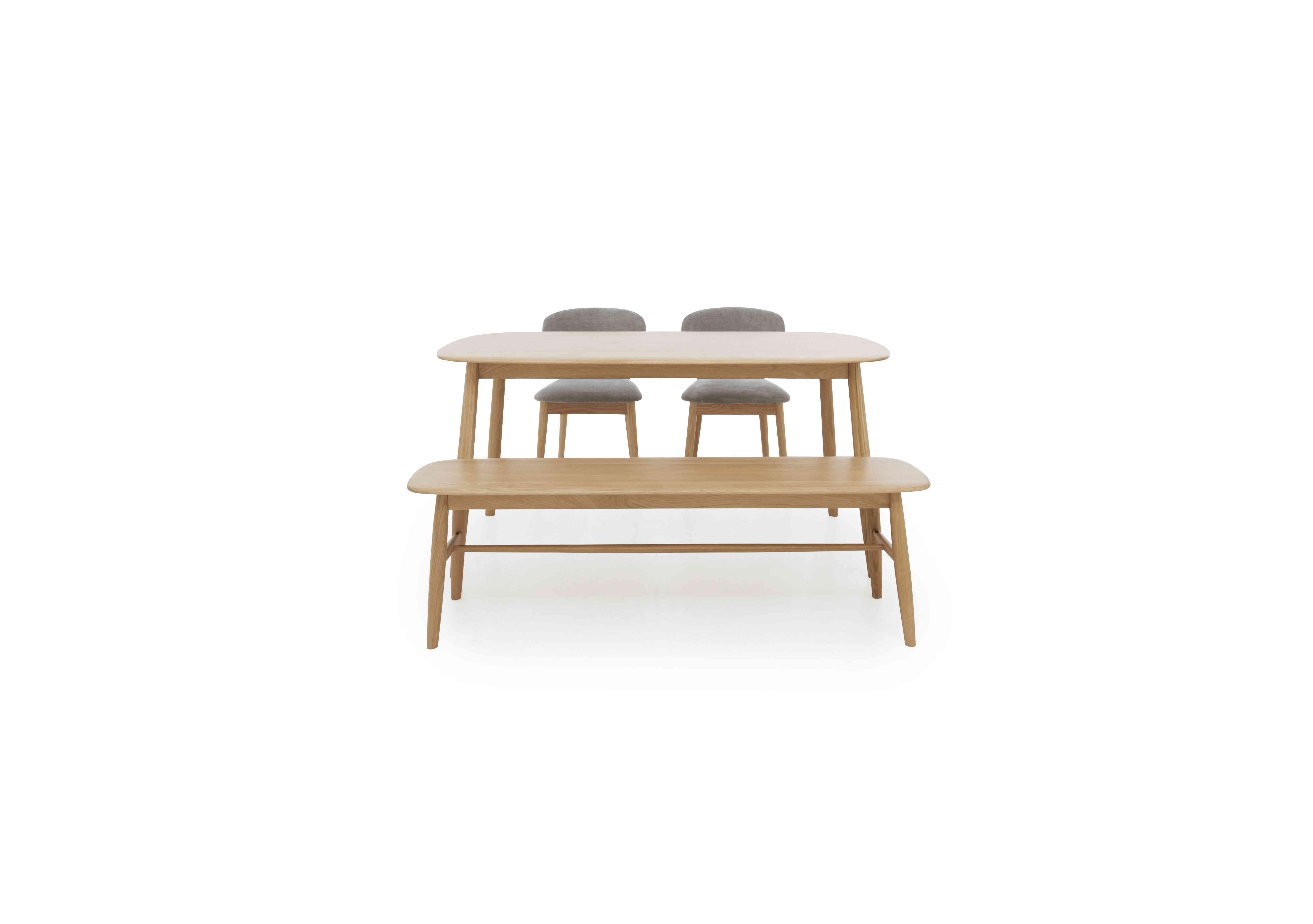 Stockholm Fixed Dining Table with 2 Wooden Dining Chairs and a Dining Bench in Light Oak on Furniture Village