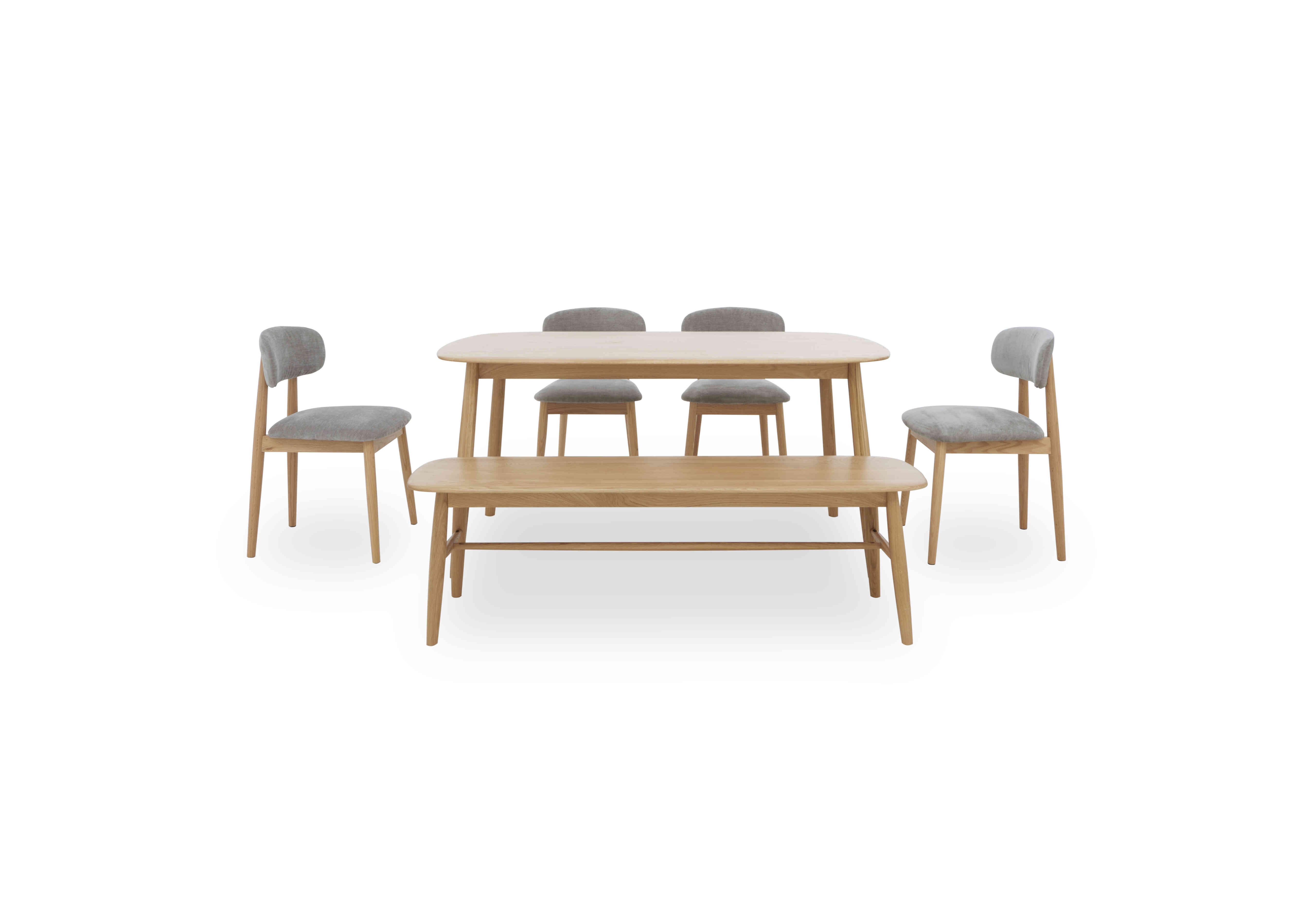 Stockholm Fixed Dining Table with 4 Wooden Dining Chairs and a Dining Bench in Light Oak on Furniture Village