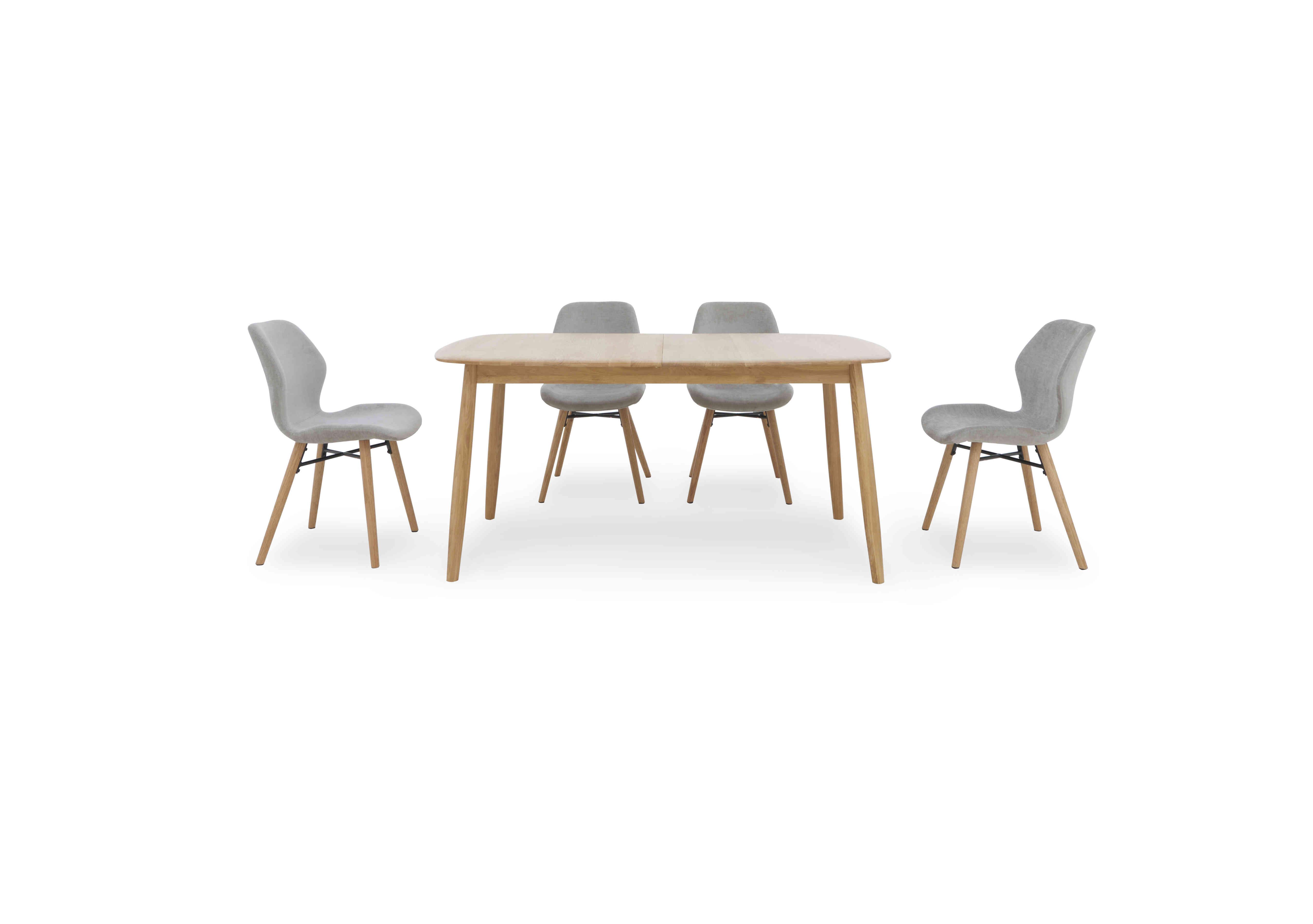 Stockholm Extending Dining Table with 4 Upholstered Dining Chairs in Light Oak on Furniture Village