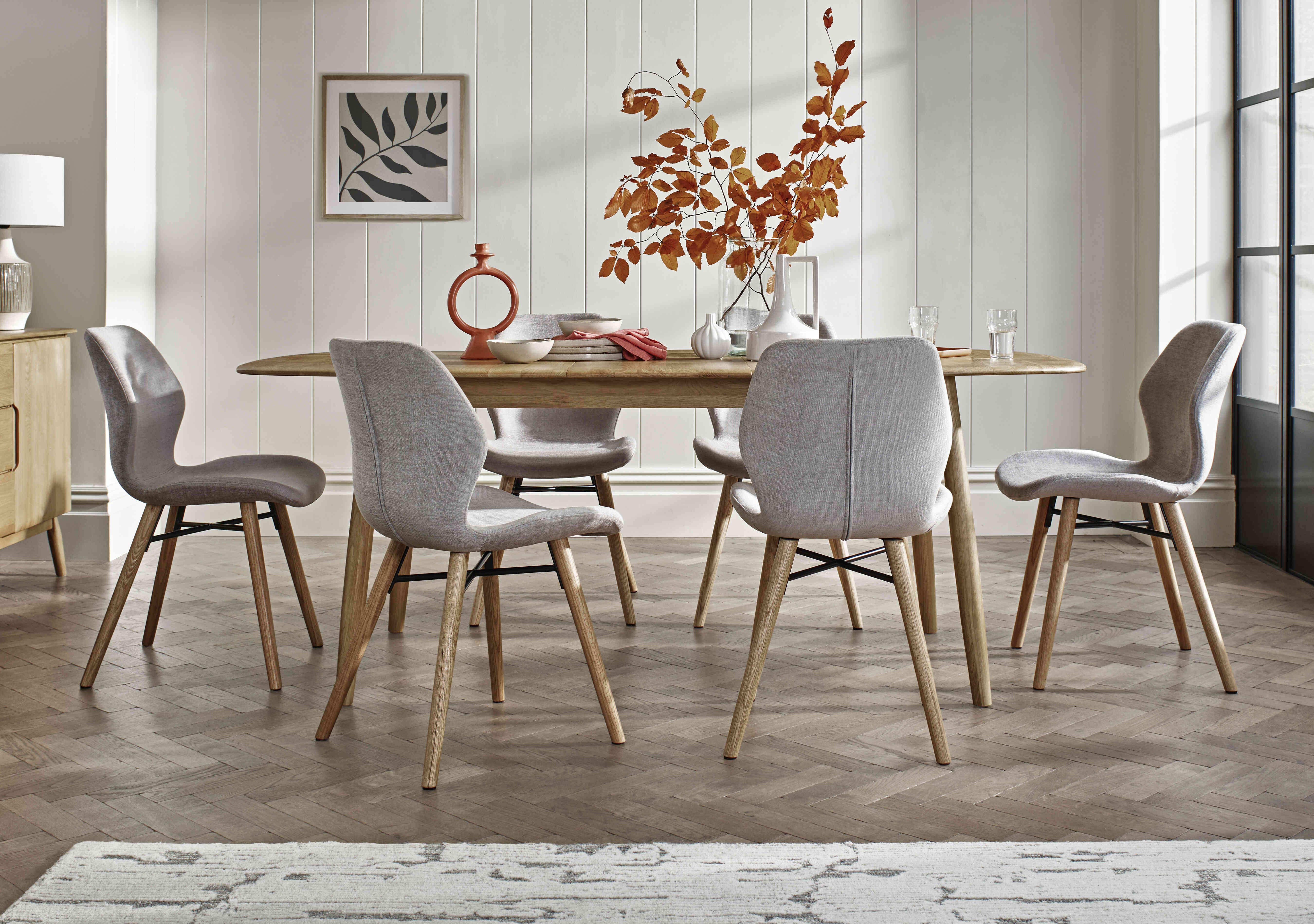 Stockholm Extending Dining Table with 6 Upholstered Dining Chairs in  on Furniture Village