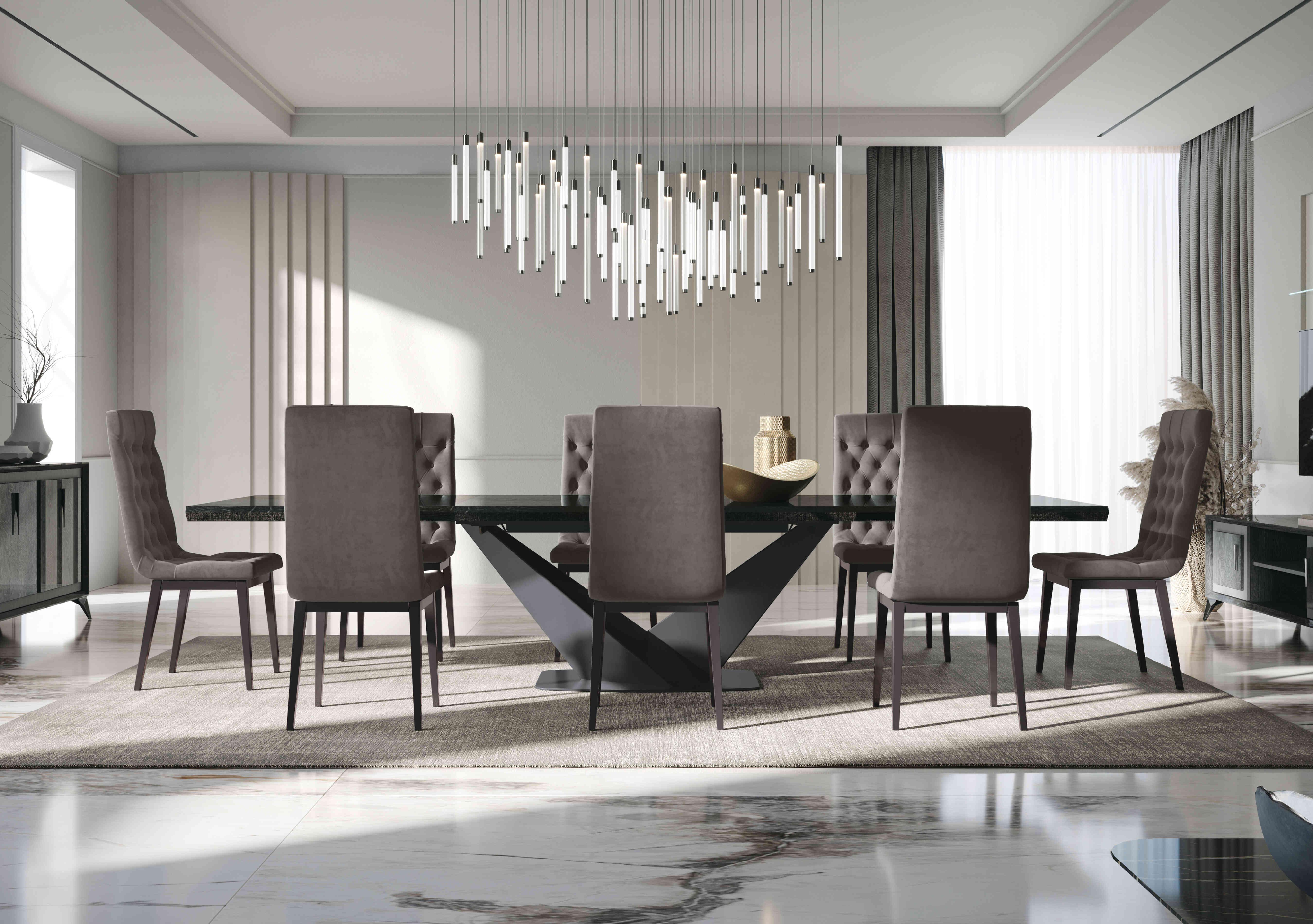 Vita Extending Dining Table and 8 Button Back Dining Chairs in  on Furniture Village