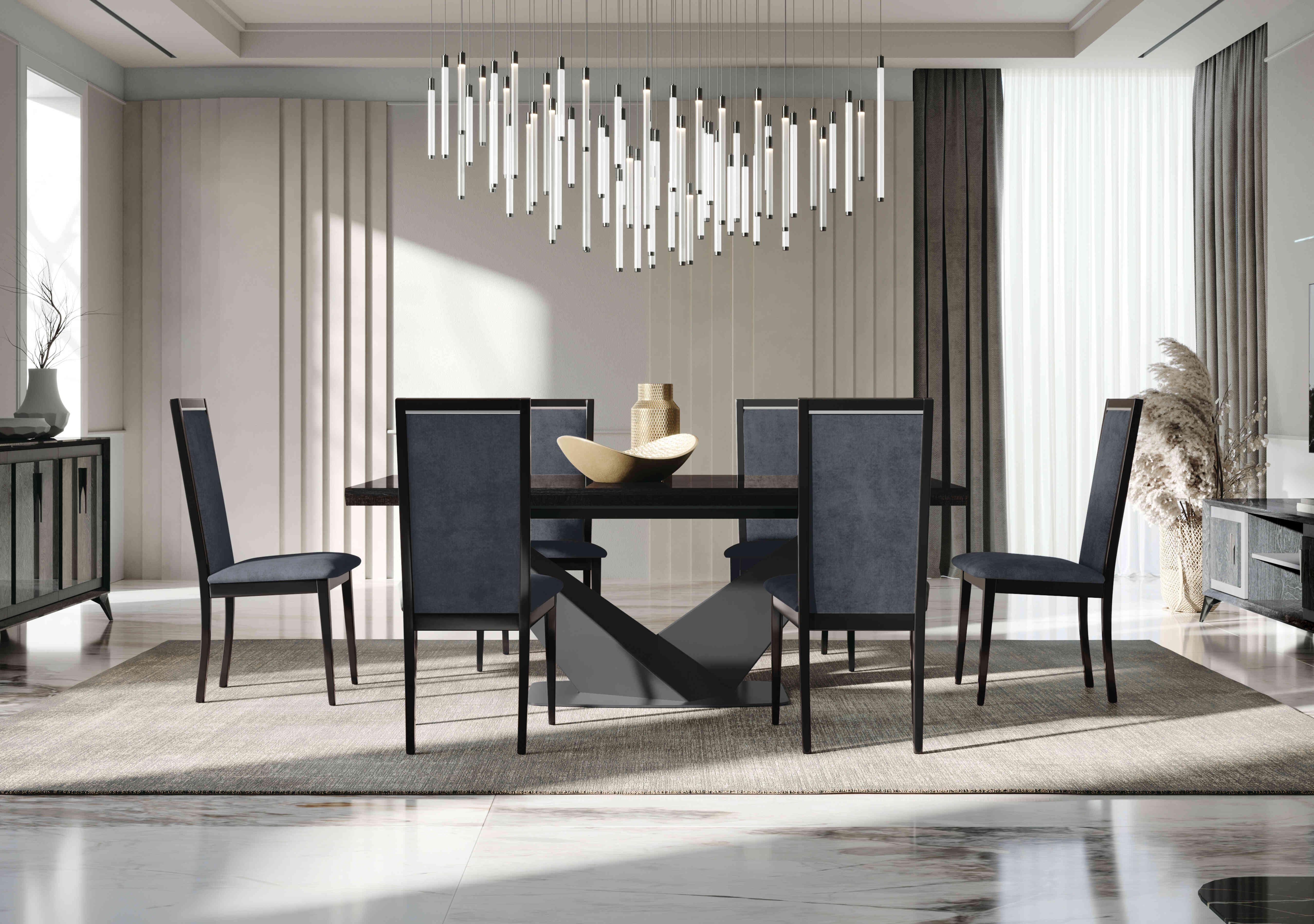 Vita Extending Dining Table and 6 Wooden Dining Chairs with Plain Upholstered Backs in  on Furniture Village
