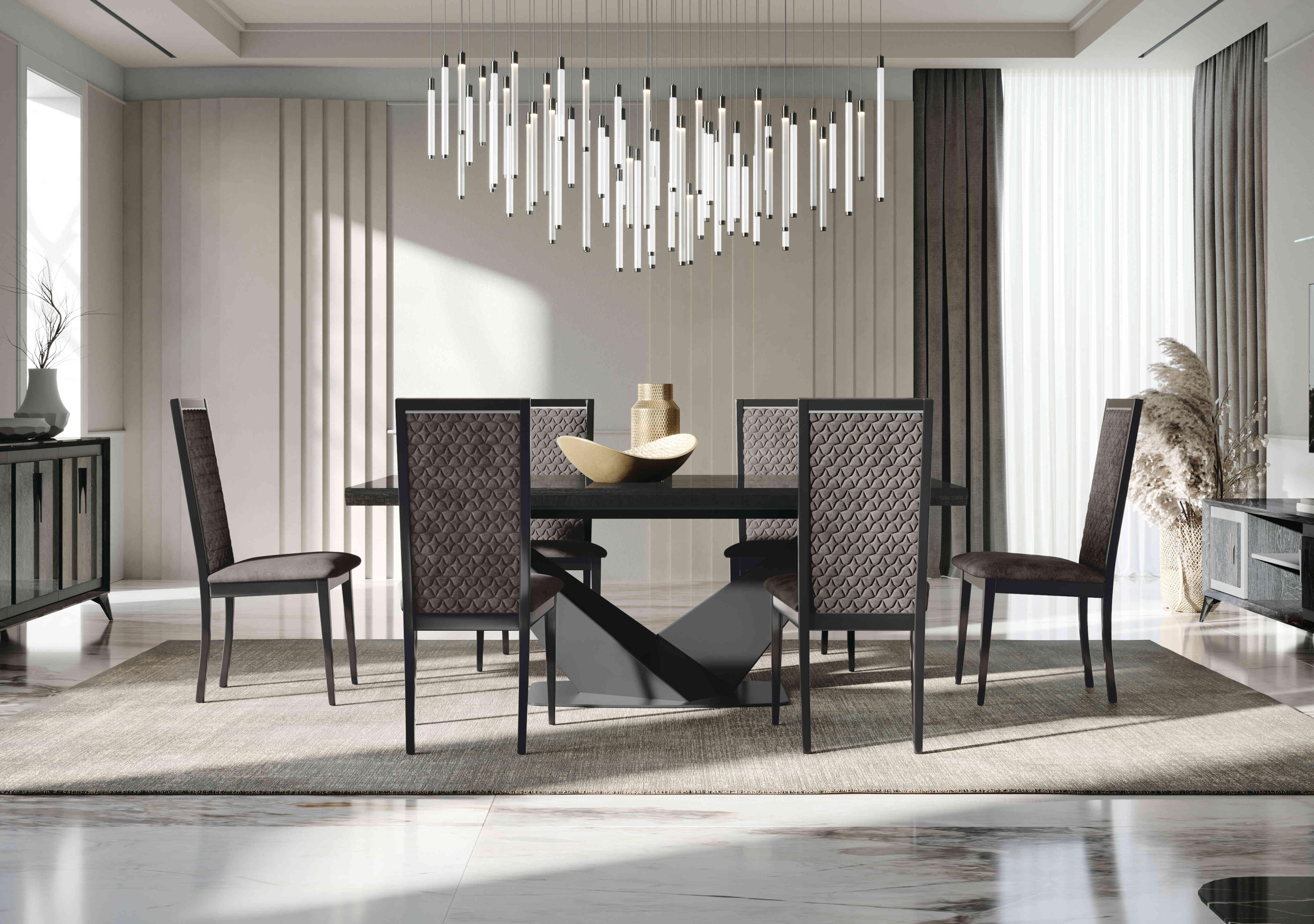 Vita Extending Dining Table and 6 Wooden Dining Chairs with Patterned Upholstered Backs in  on Furniture Village