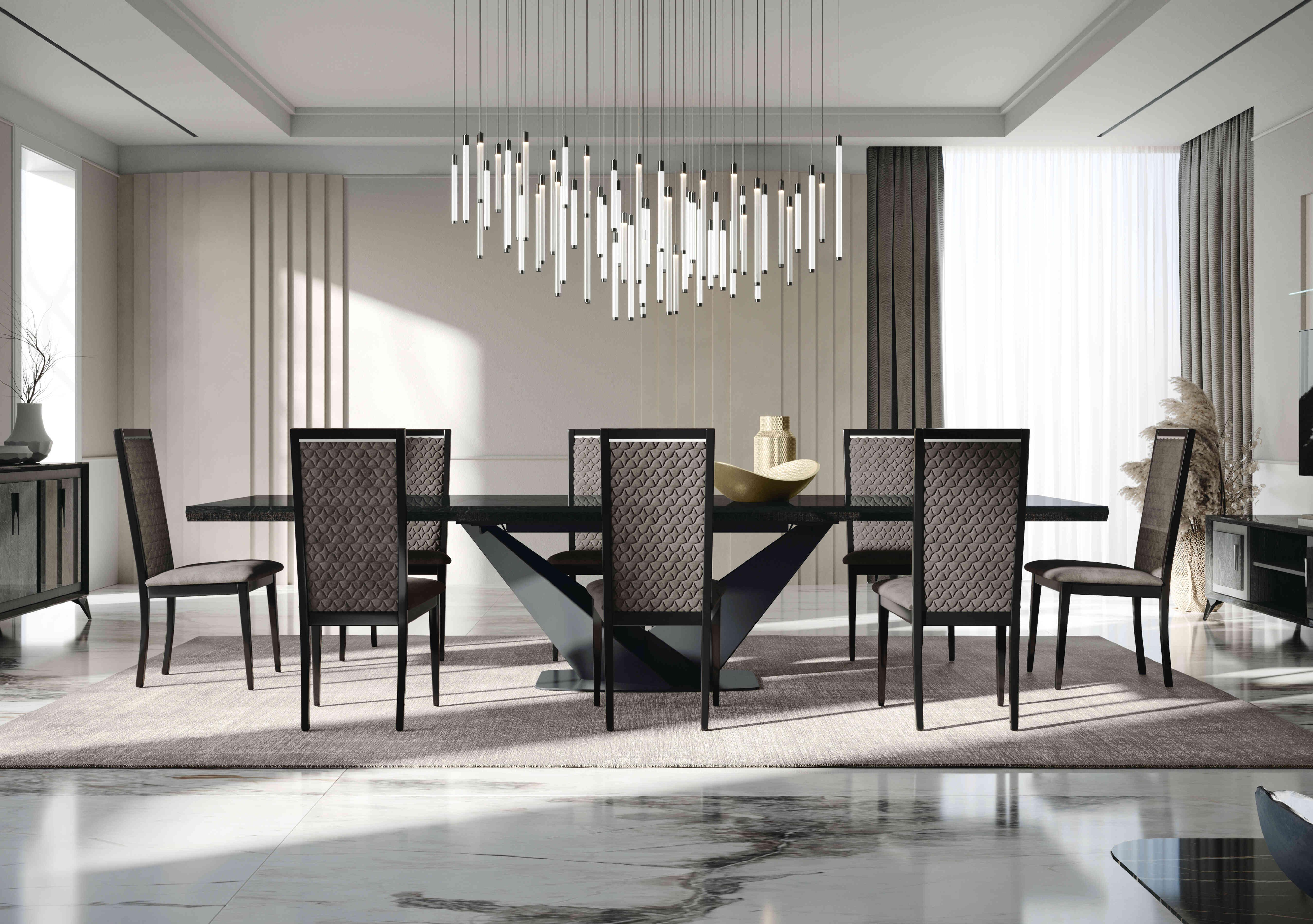 Vita Extending Dining Table and 8 Wooden Dining Chairs with Patterned Upholstered Backs in  on Furniture Village