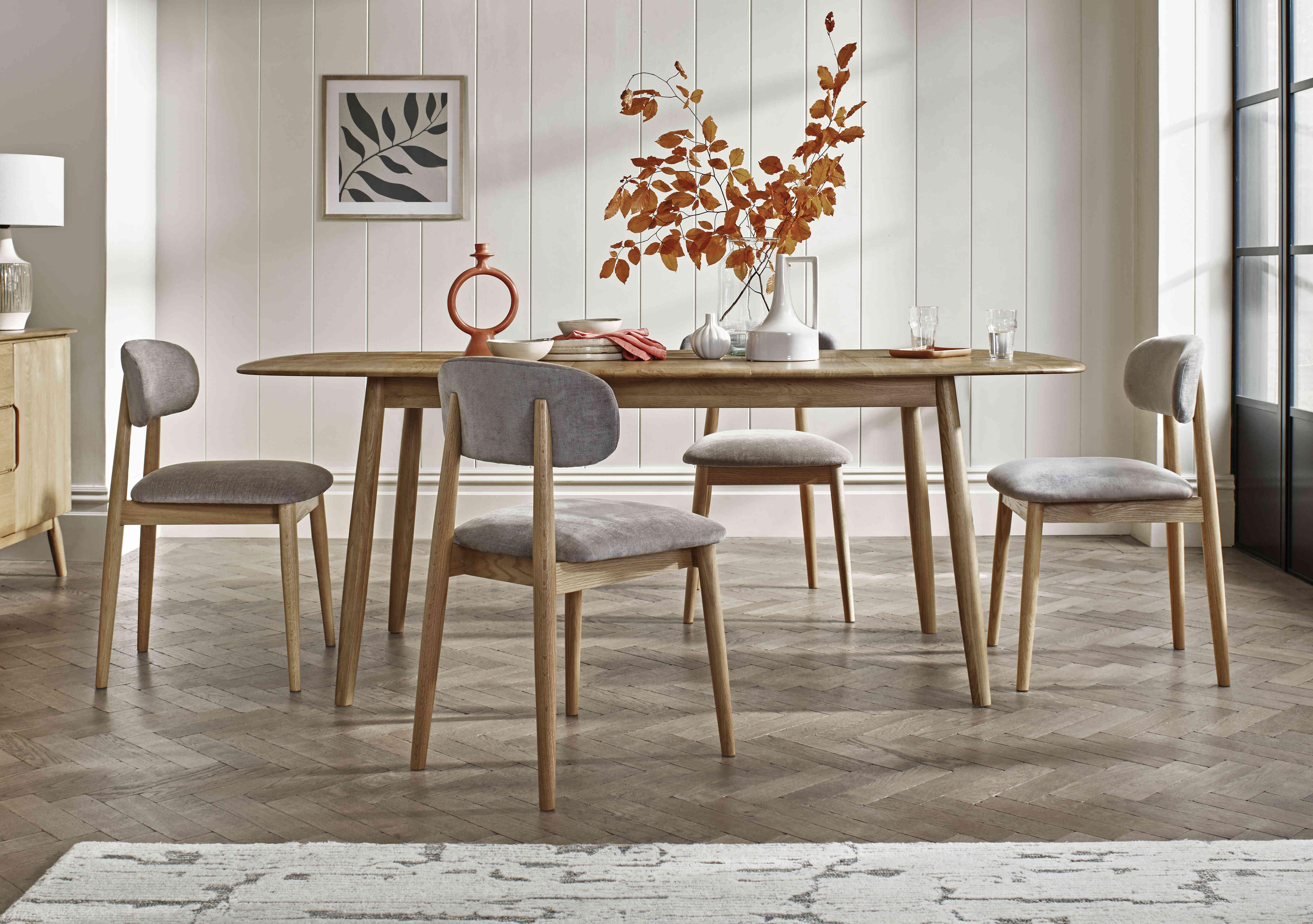 Stockholm Extending Dining Table with 4 Wooden Dining Chairs in  on Furniture Village
