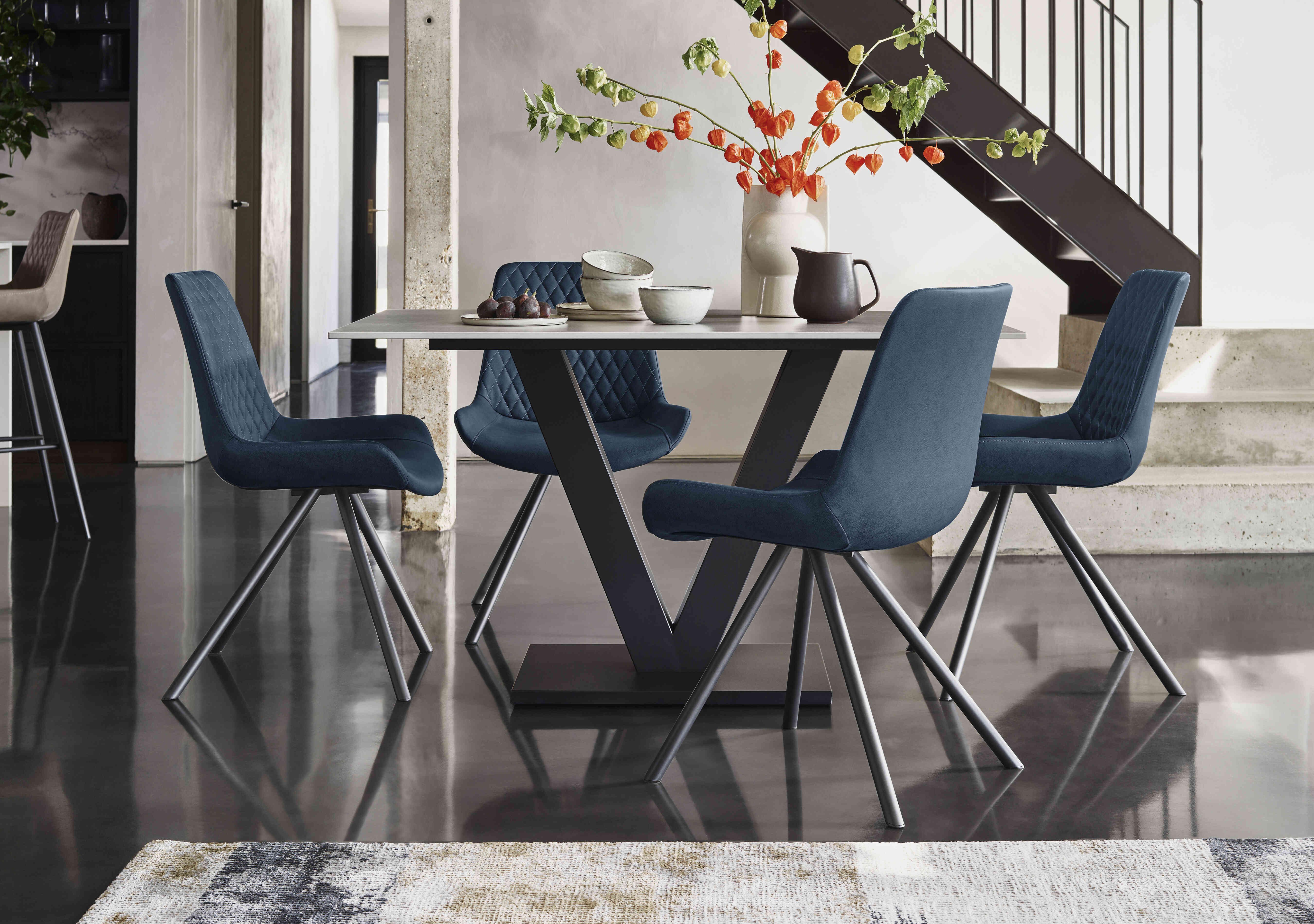 Ion Fixed Dining Table with 4 Fabric Dining Chairs in  on Furniture Village