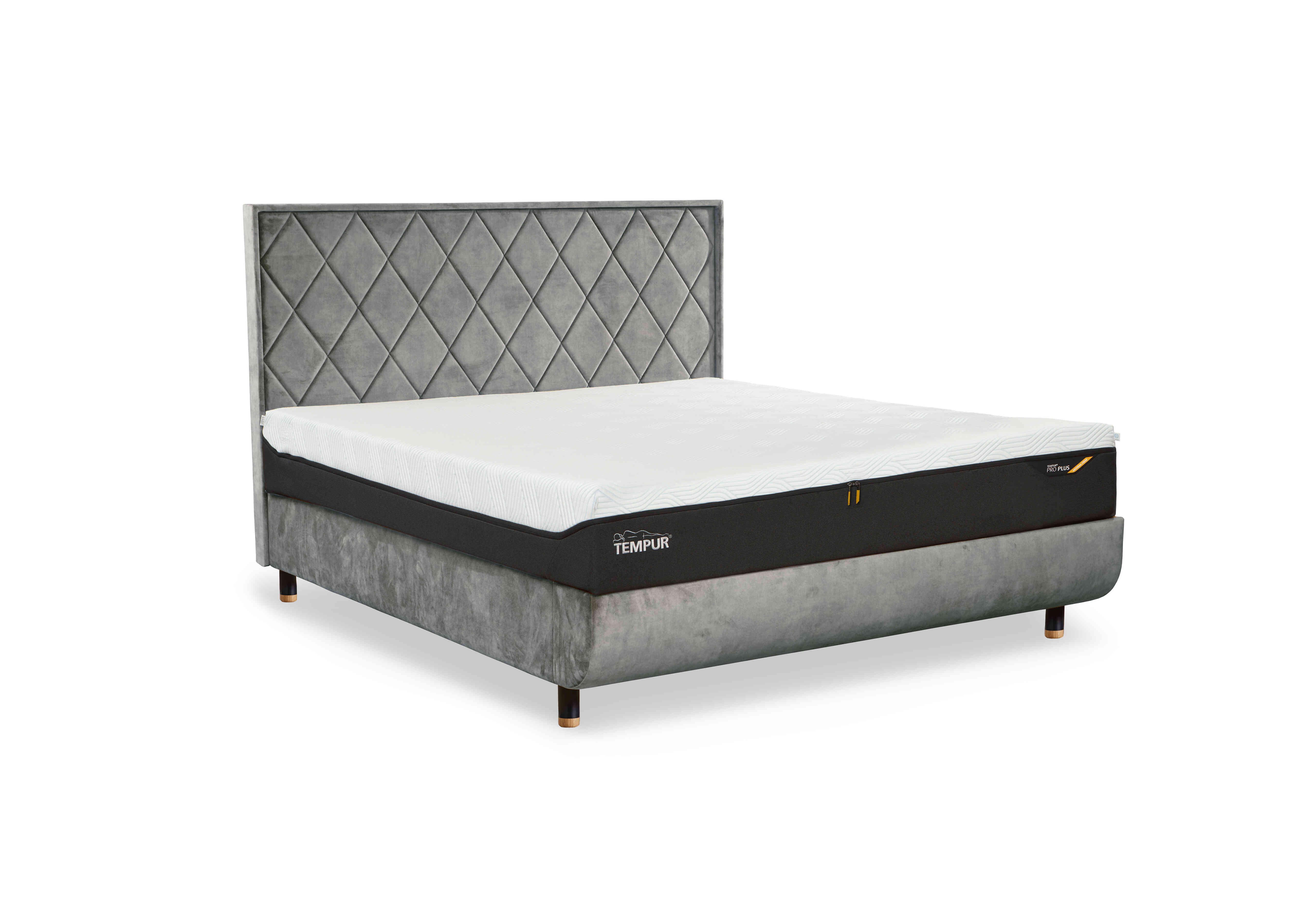 Arc Disc Bed Frame with Quilted Headboard in Stone-Matt Black Feet on Furniture Village