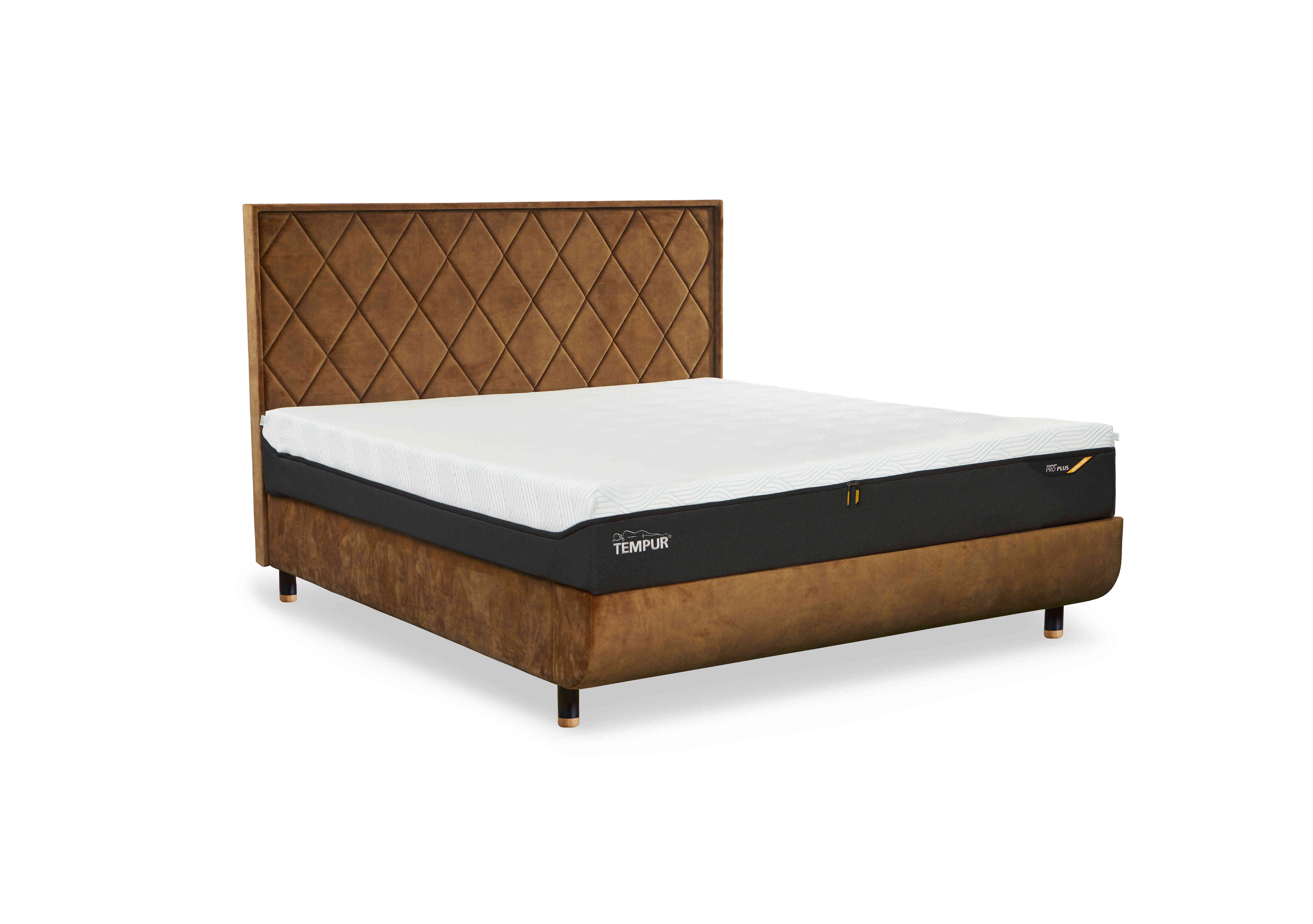 Arc Disc Ottoman Bed Frame with Quilted Headboard in Brown-Black/Oak Feet on Furniture Village