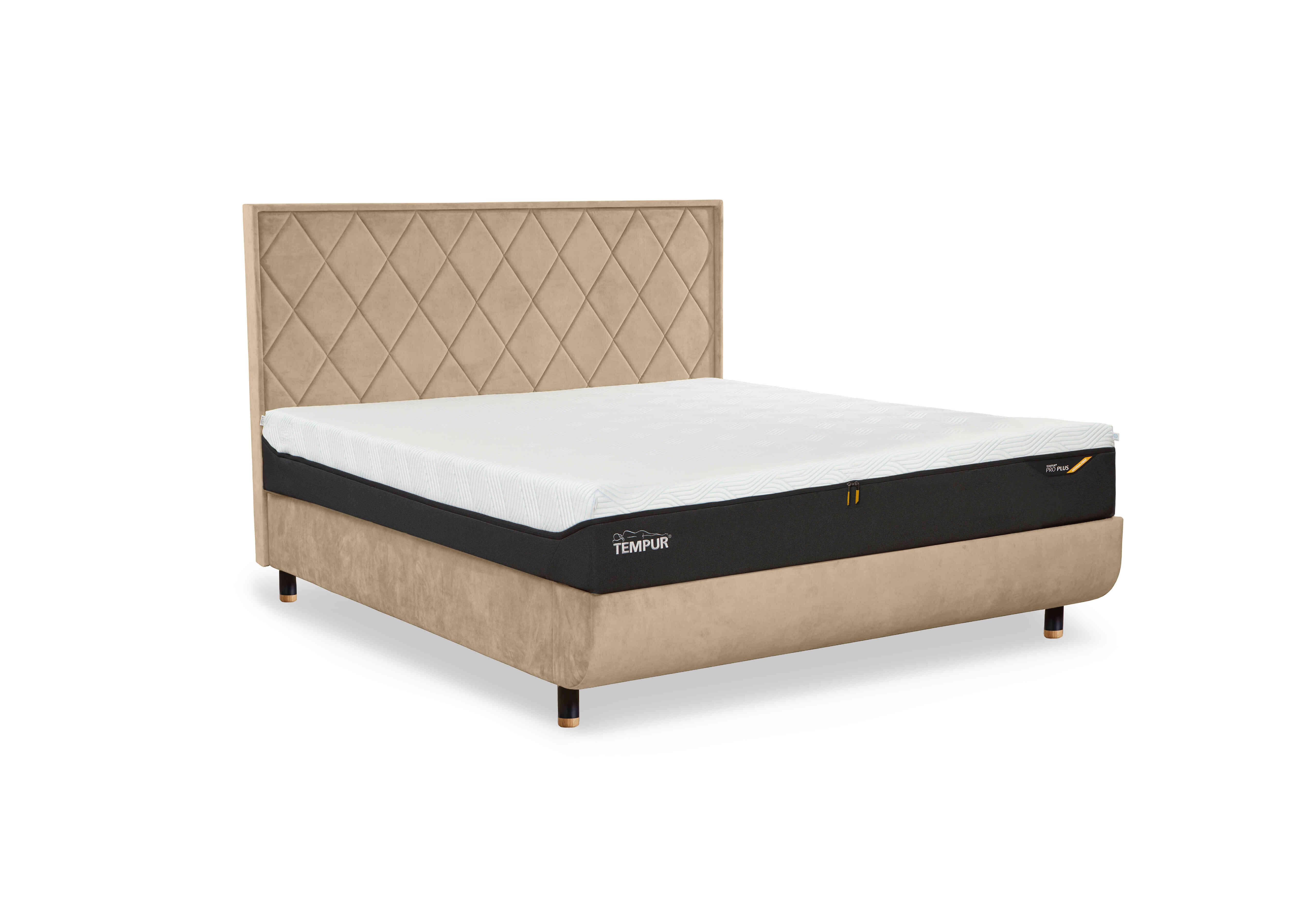 Arc Disc Ottoman Bed Frame with Quilted Headboard in Sand-Black/Gold Feet on Furniture Village