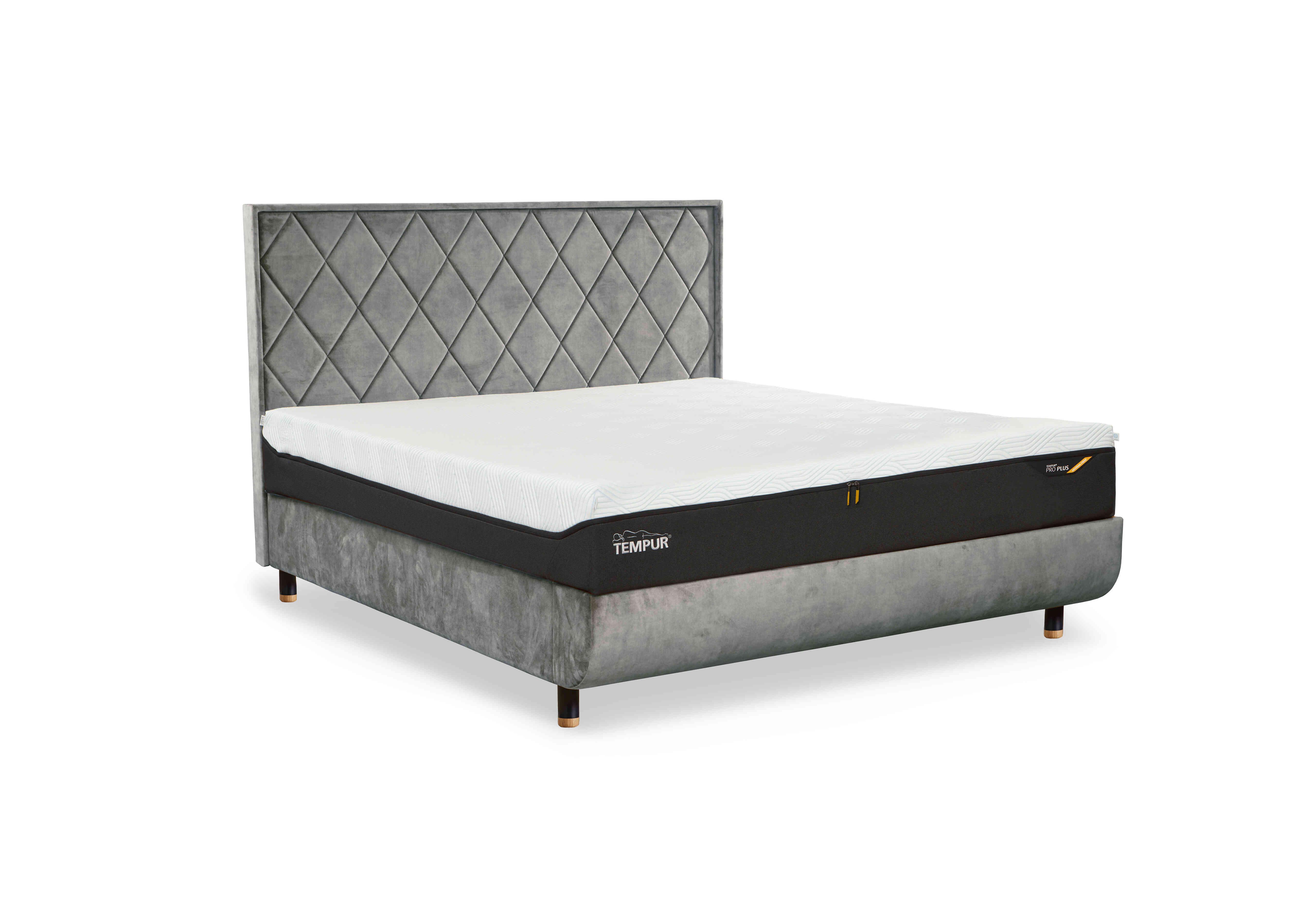 Arc Slatted Ottoman Bed Frame with Quilted Headboard in Stone-Natural Ash Feet on Furniture Village