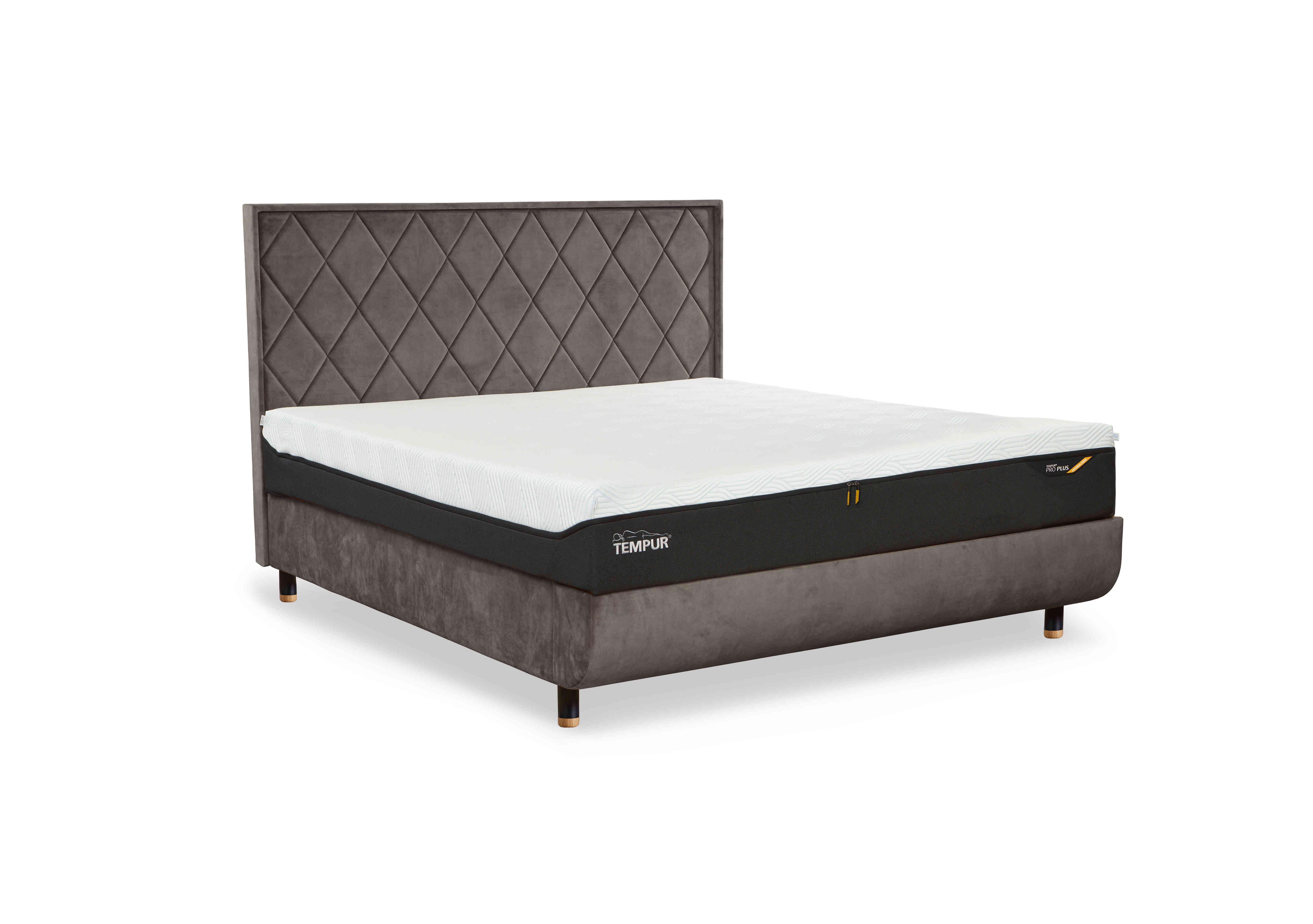 Arc Slatted Ottoman Bed Frame with Quilted Headboard in Warm Stone-Black/Oak Feet on Furniture Village