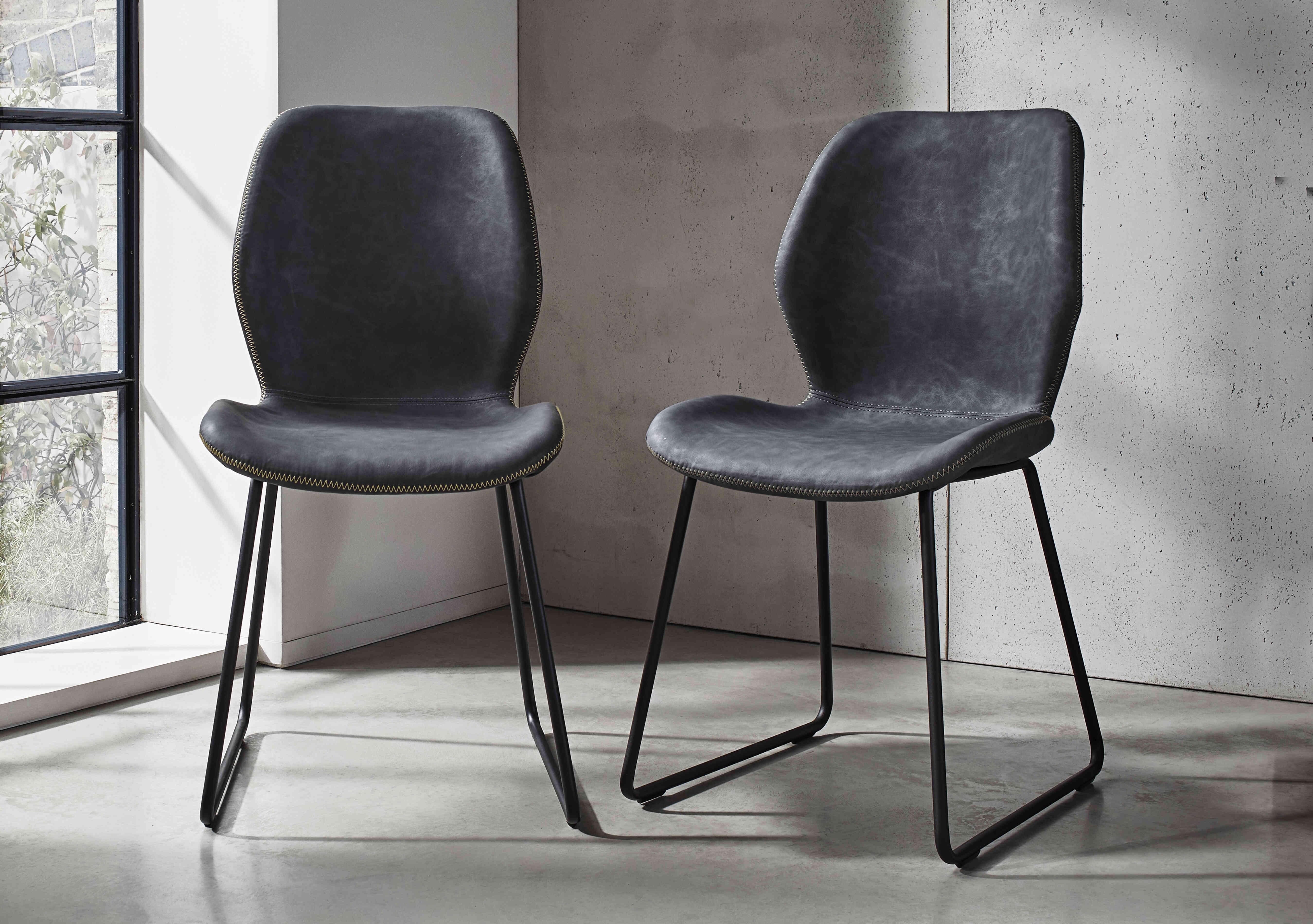 Matteo Set of 6 Faux Leather Ski Leg Dining Chairs in  on Furniture Village