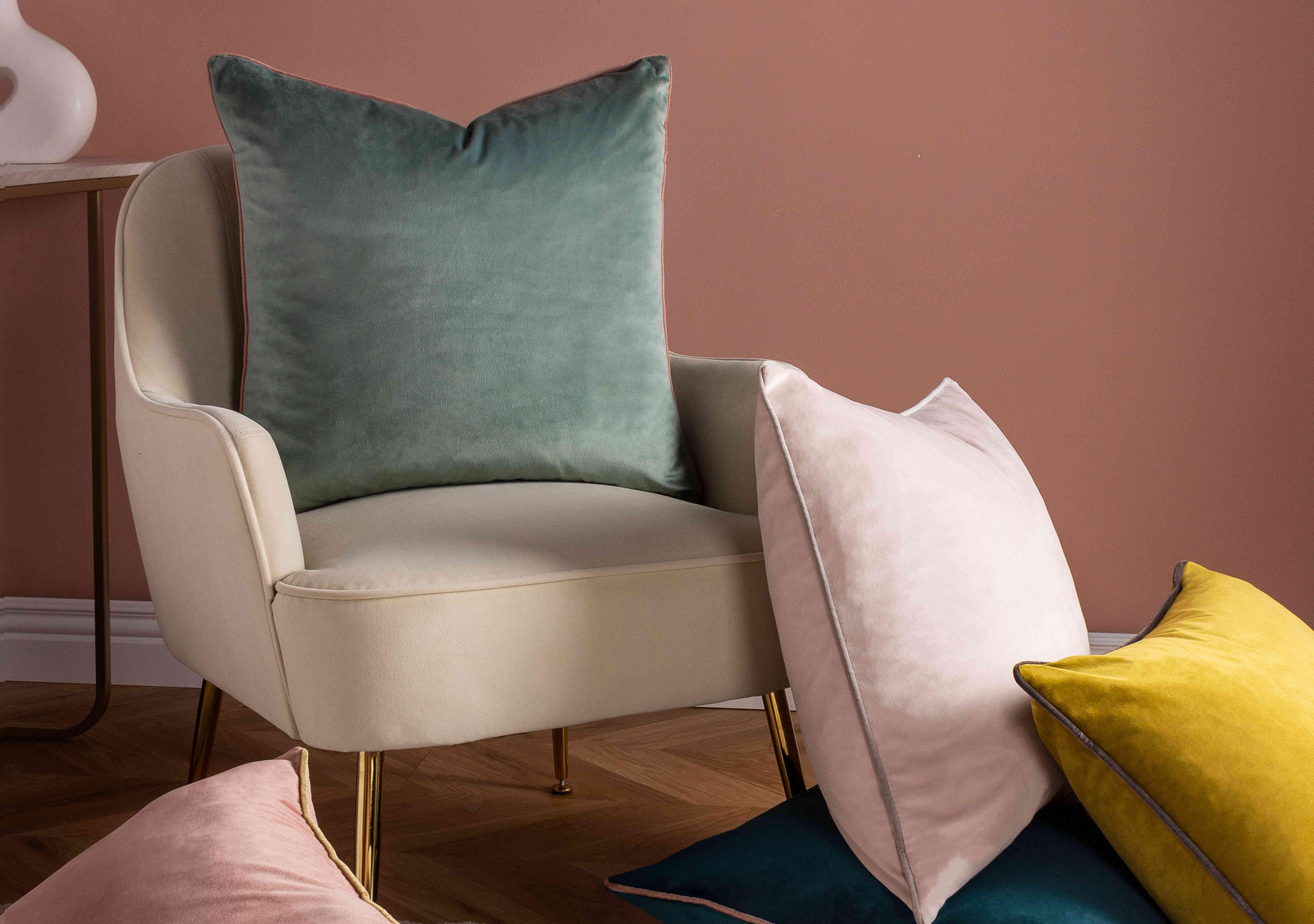 Madison Feather Cushion in  on Furniture Village