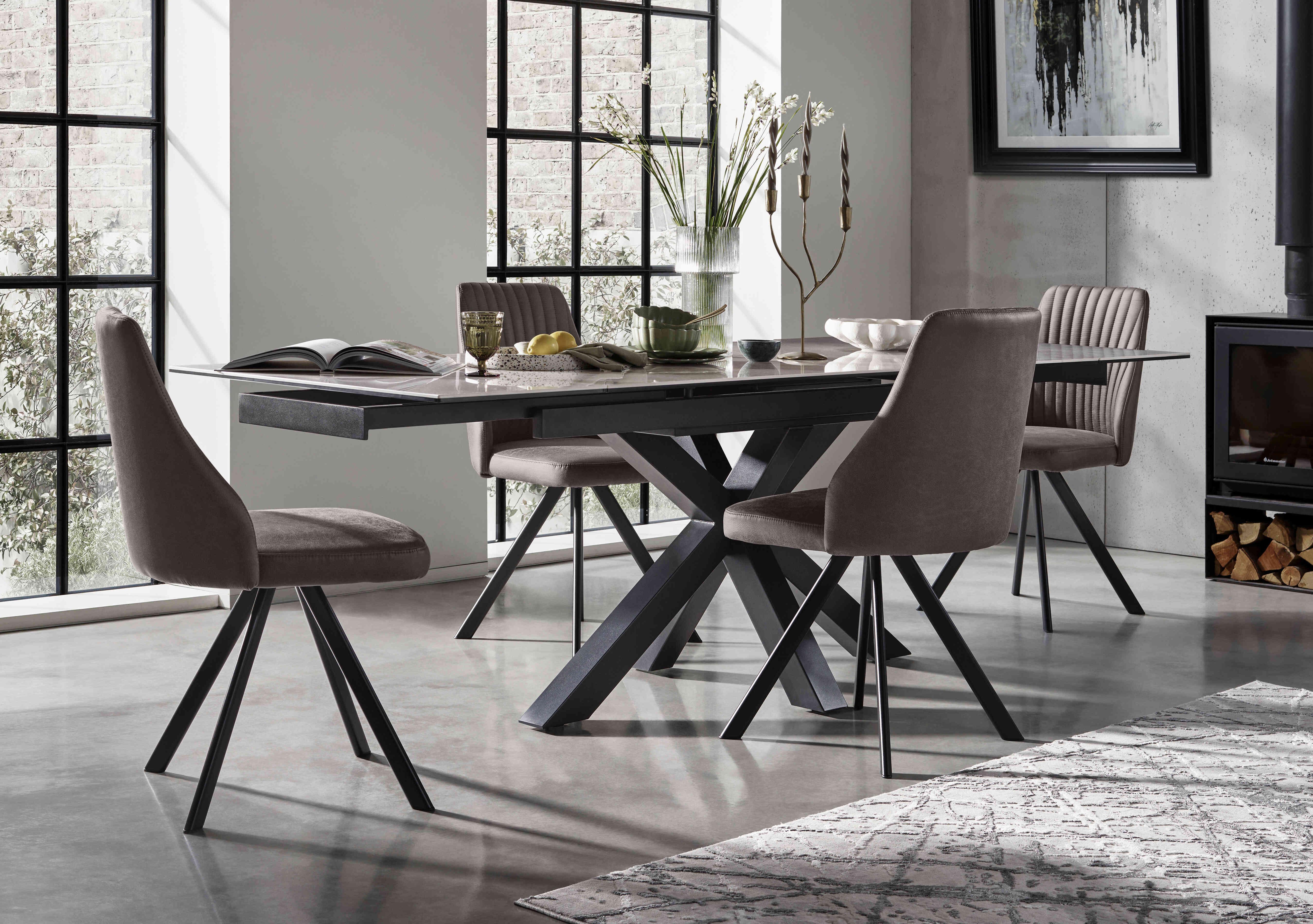 Vida Grey Extending Dining Table and 4 Swivel Dining Chairs in  on Furniture Village