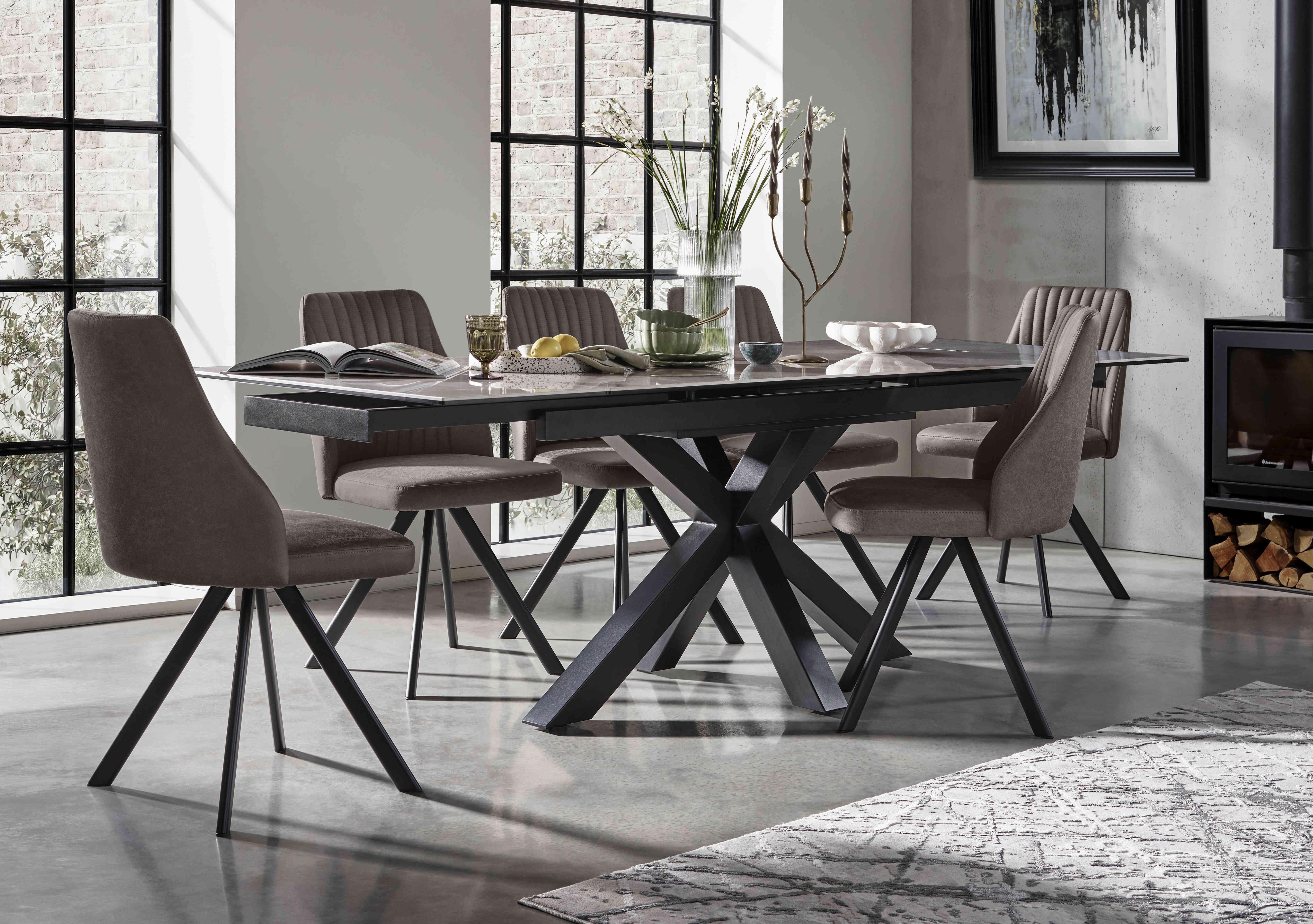 Vida Grey Extending Dining Table and 6 Swivel Dining Chairs in  on Furniture Village