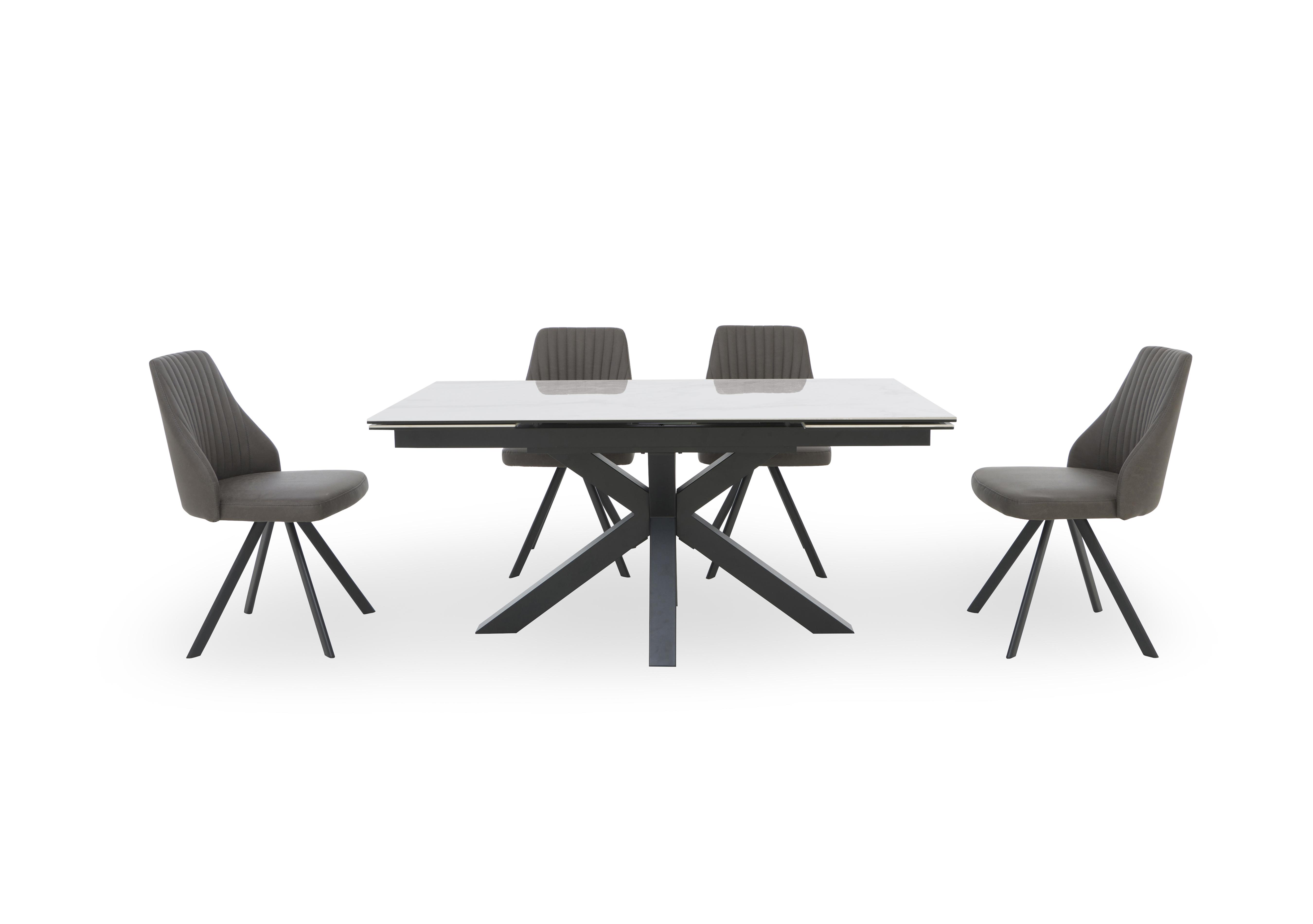 Vida White Extending Dining Table and 4 Swivel Dining Chairs in Dark Grey on Furniture Village