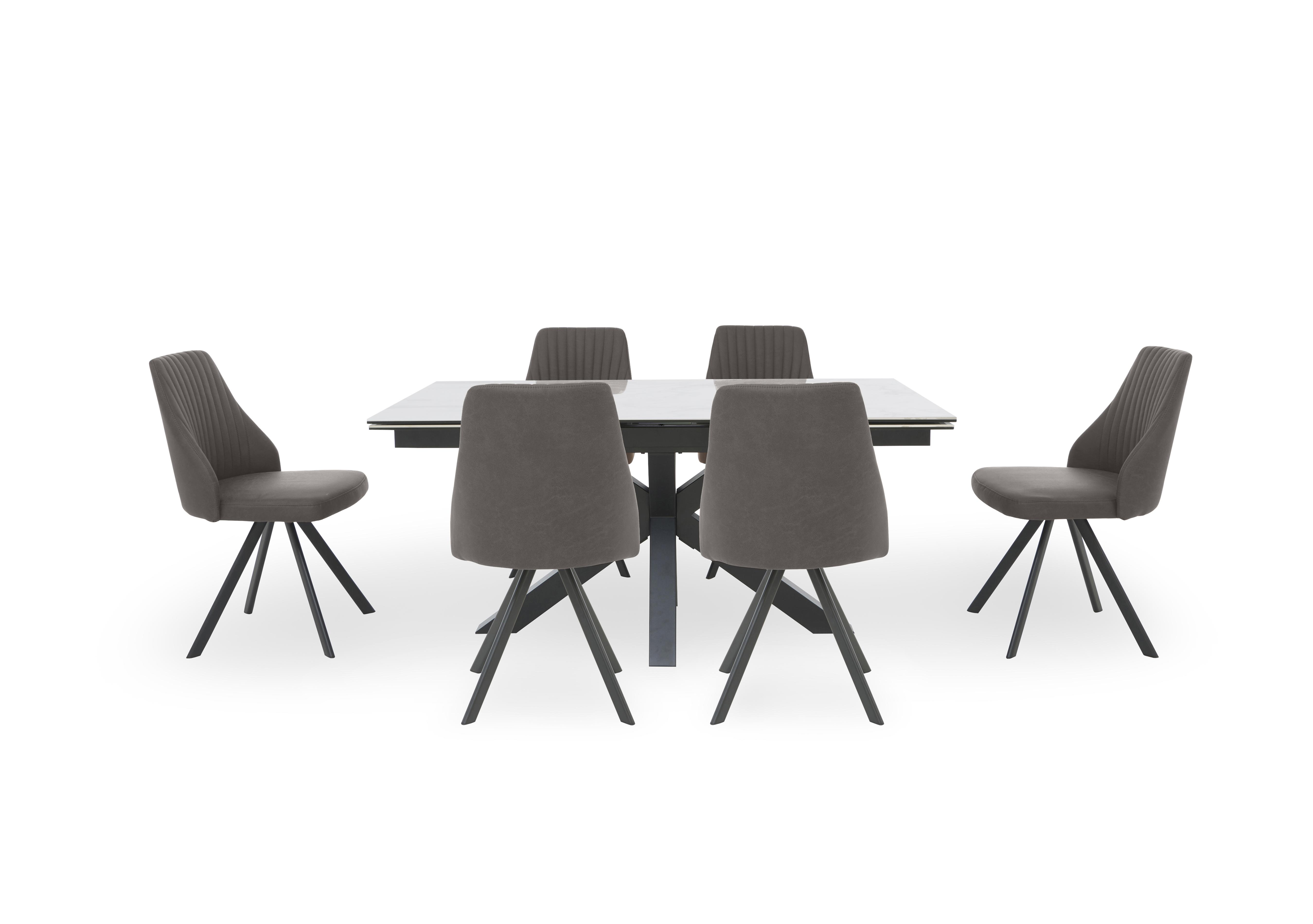 Vida White Extending Dining Table and 6 Swivel Dining Chairs in Dark Grey on Furniture Village